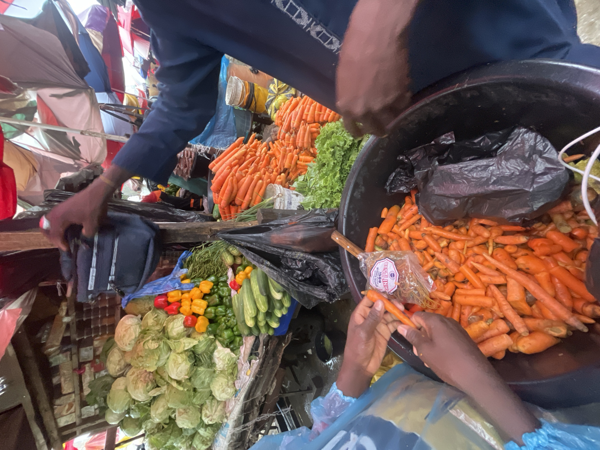 Daily marketplace life documented across Ado Nigeria during rainy morning