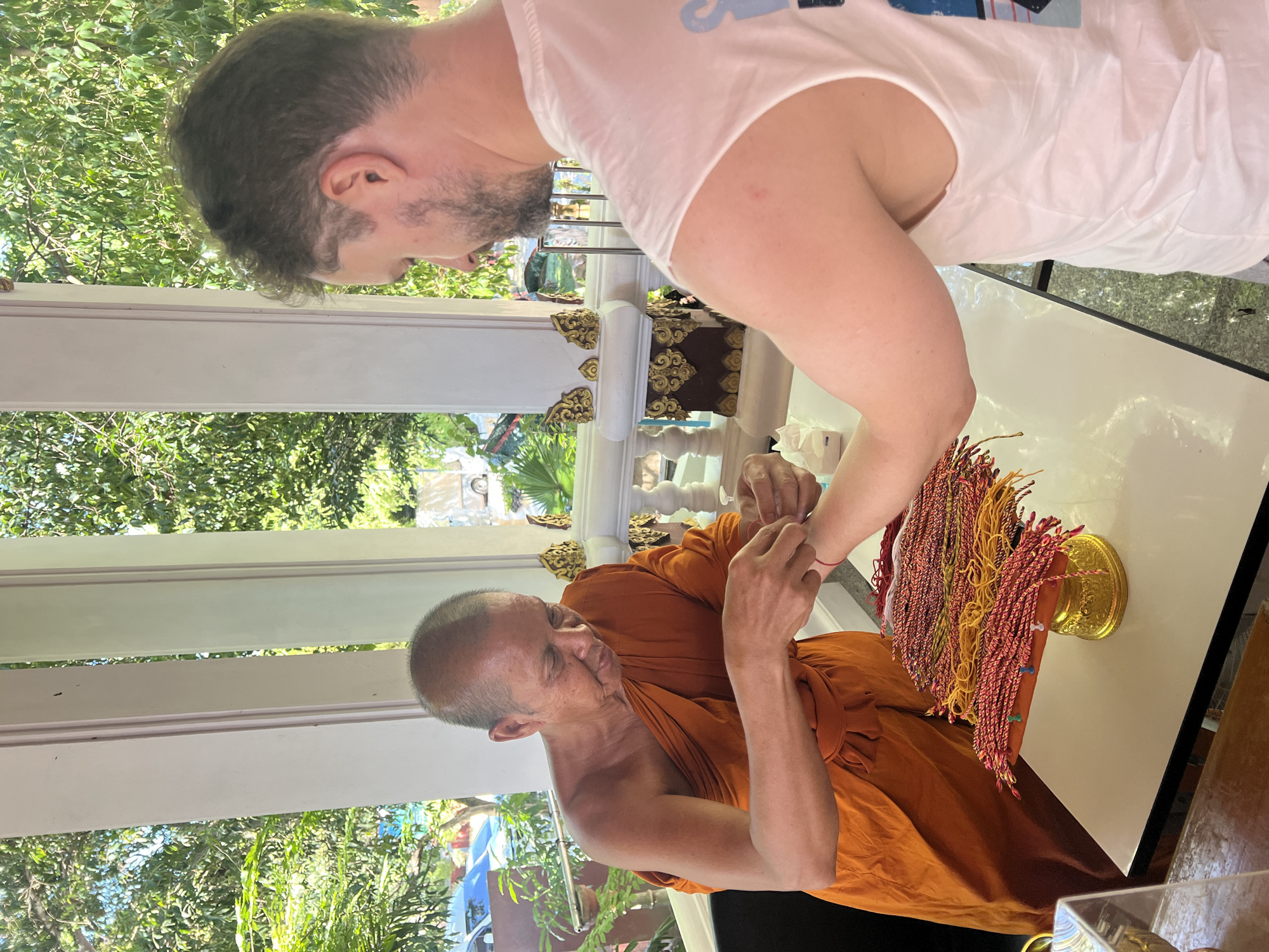 Morning temple visit with monk blessings and sai sin rituals