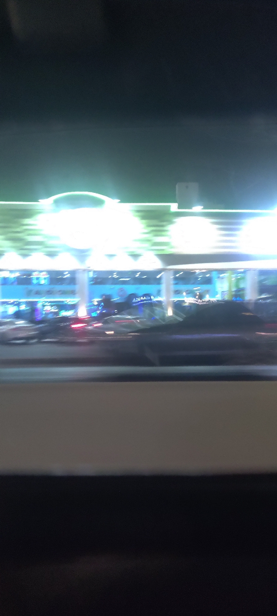 Bright commercial building observed at night in Jeddah