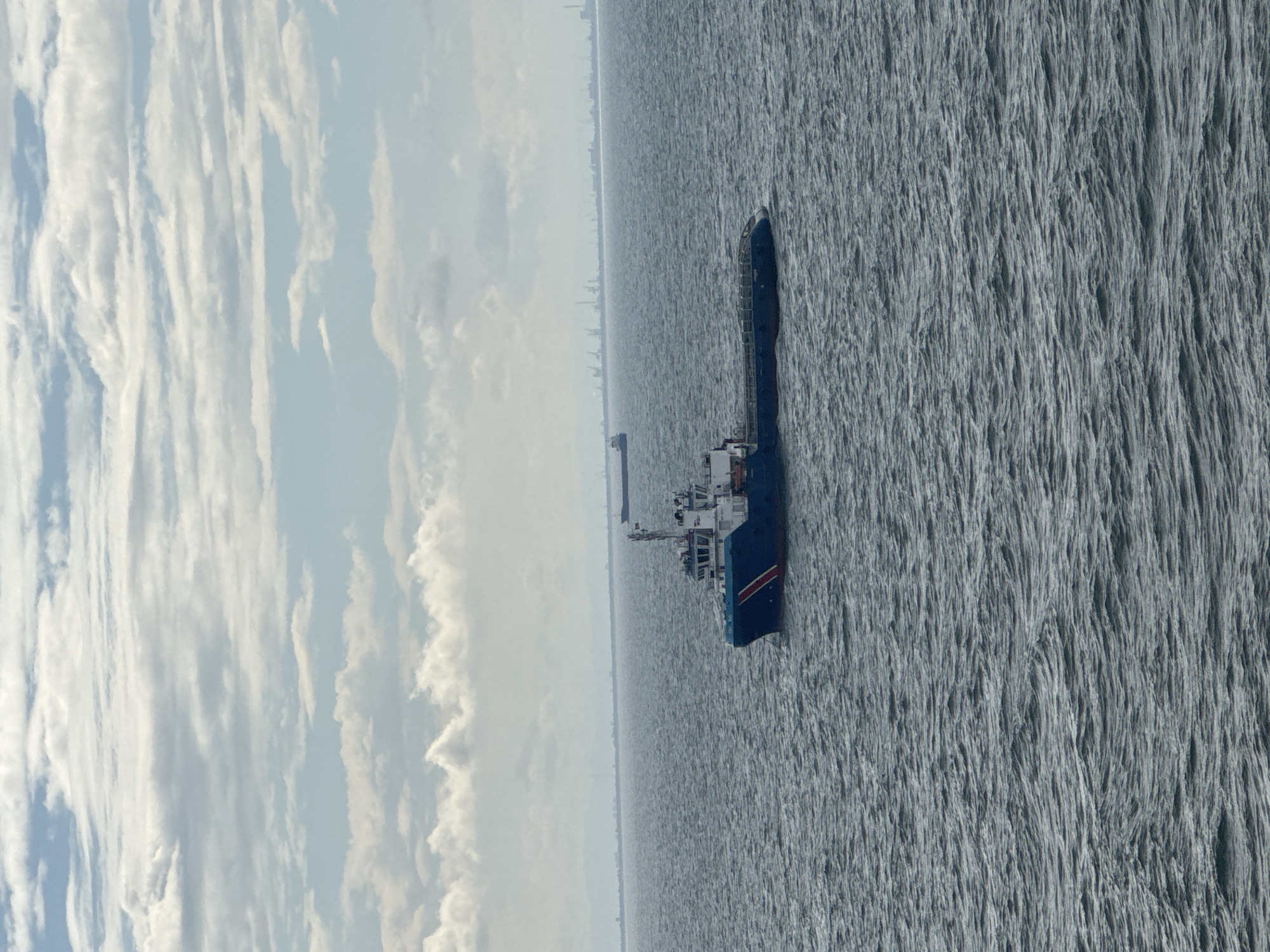 Ship spotted on Italian waters amid cloudy skies