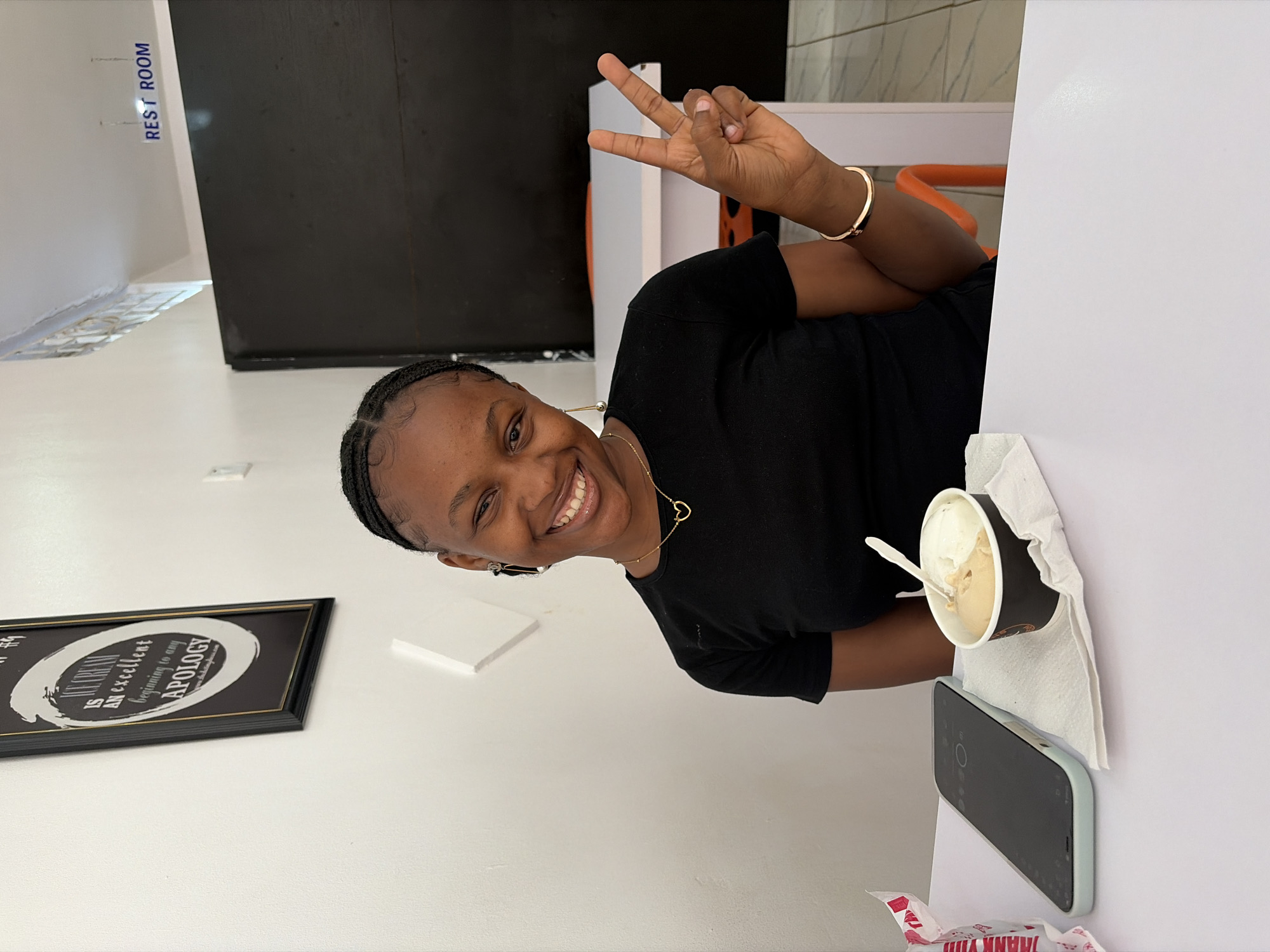 Woman enjoys cafe visit in Bar Jirgi Summa, Nigeria