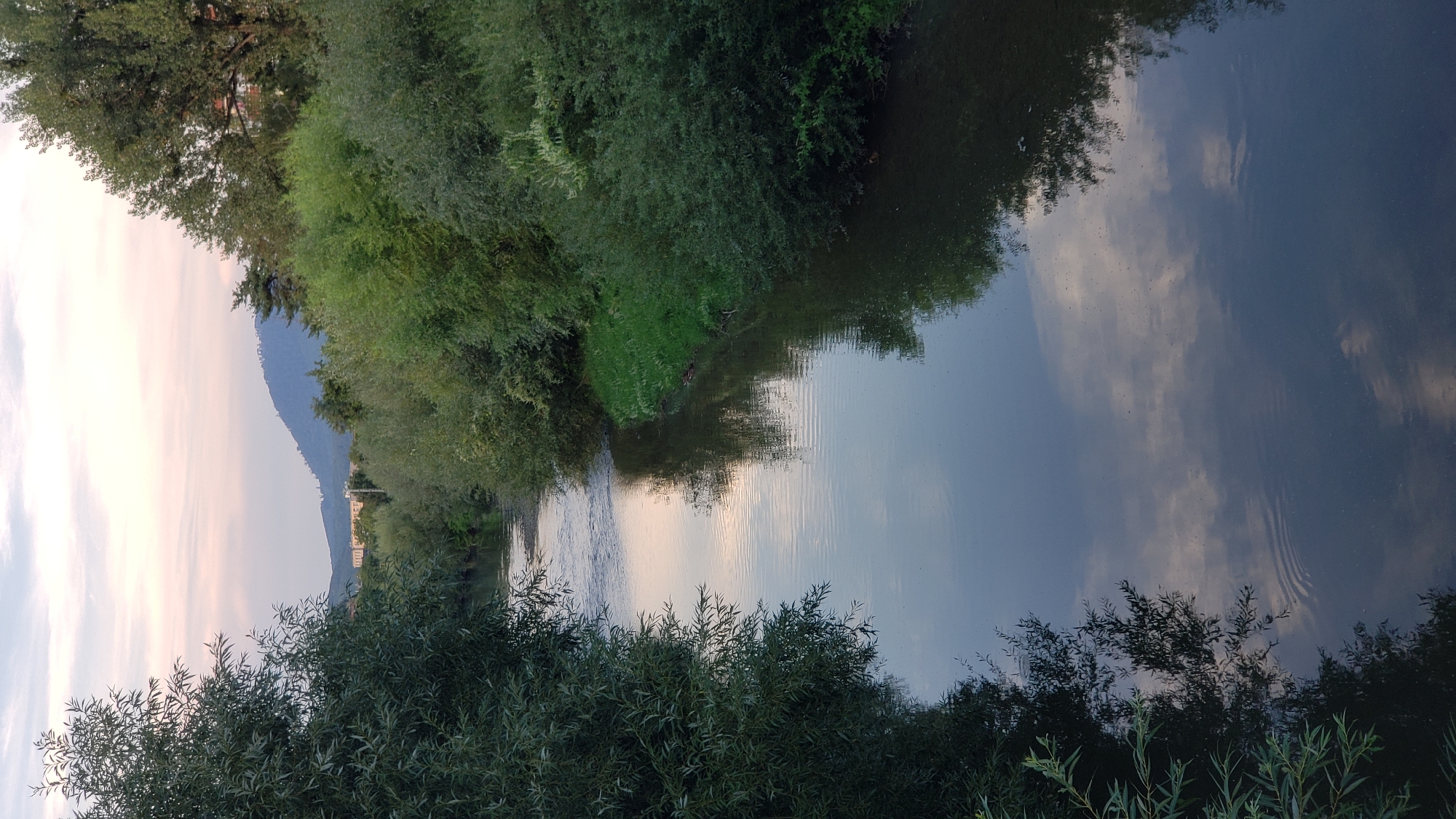 Prešov at golden hour — river, parks, and city streets winding down