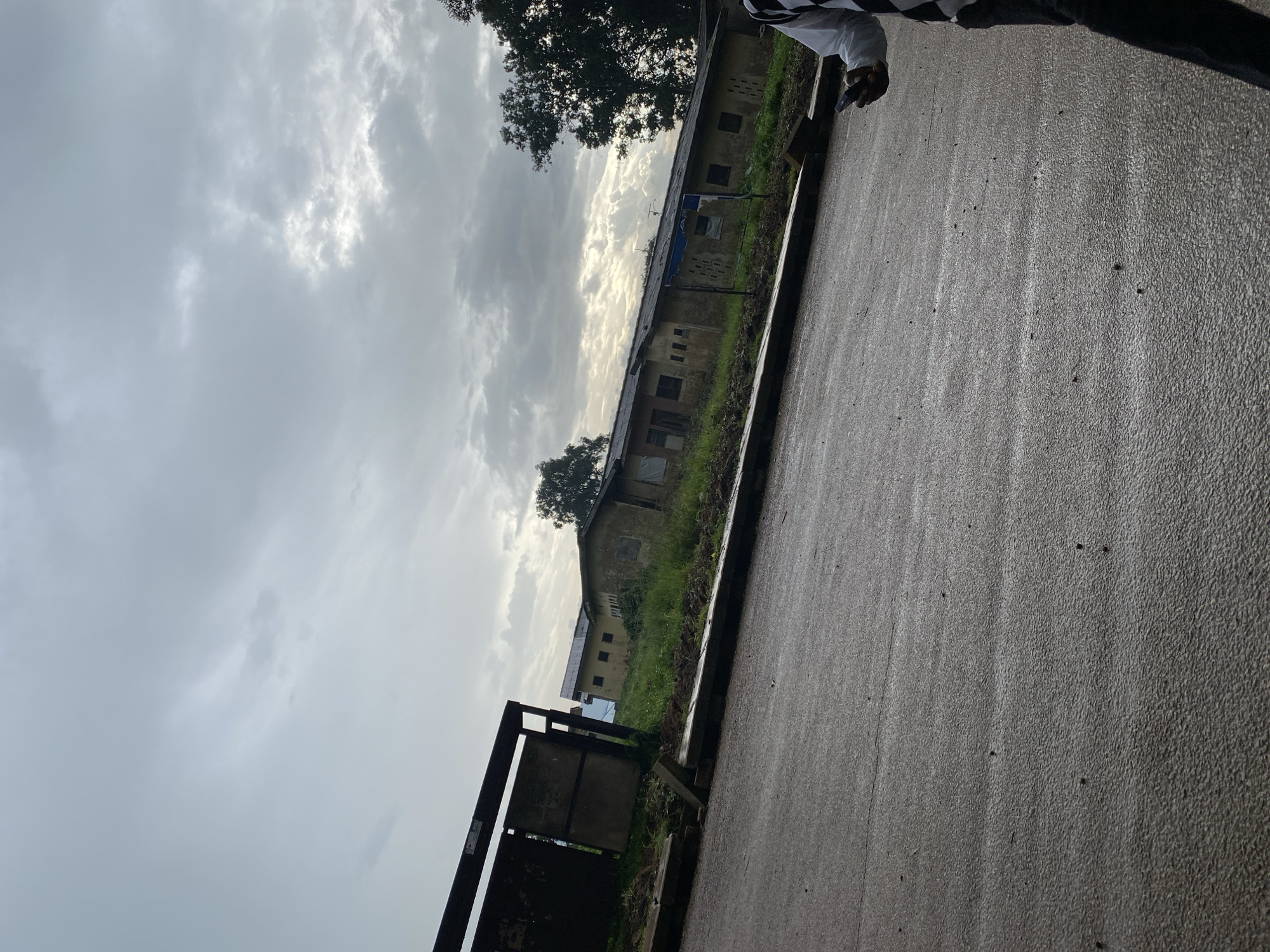 Post-rain street activity along a road in Rafin Par, Nigeria
