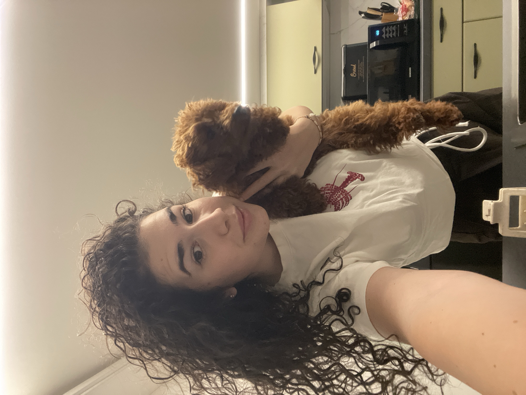 Woman takes early morning selfies with puppy in Sofia