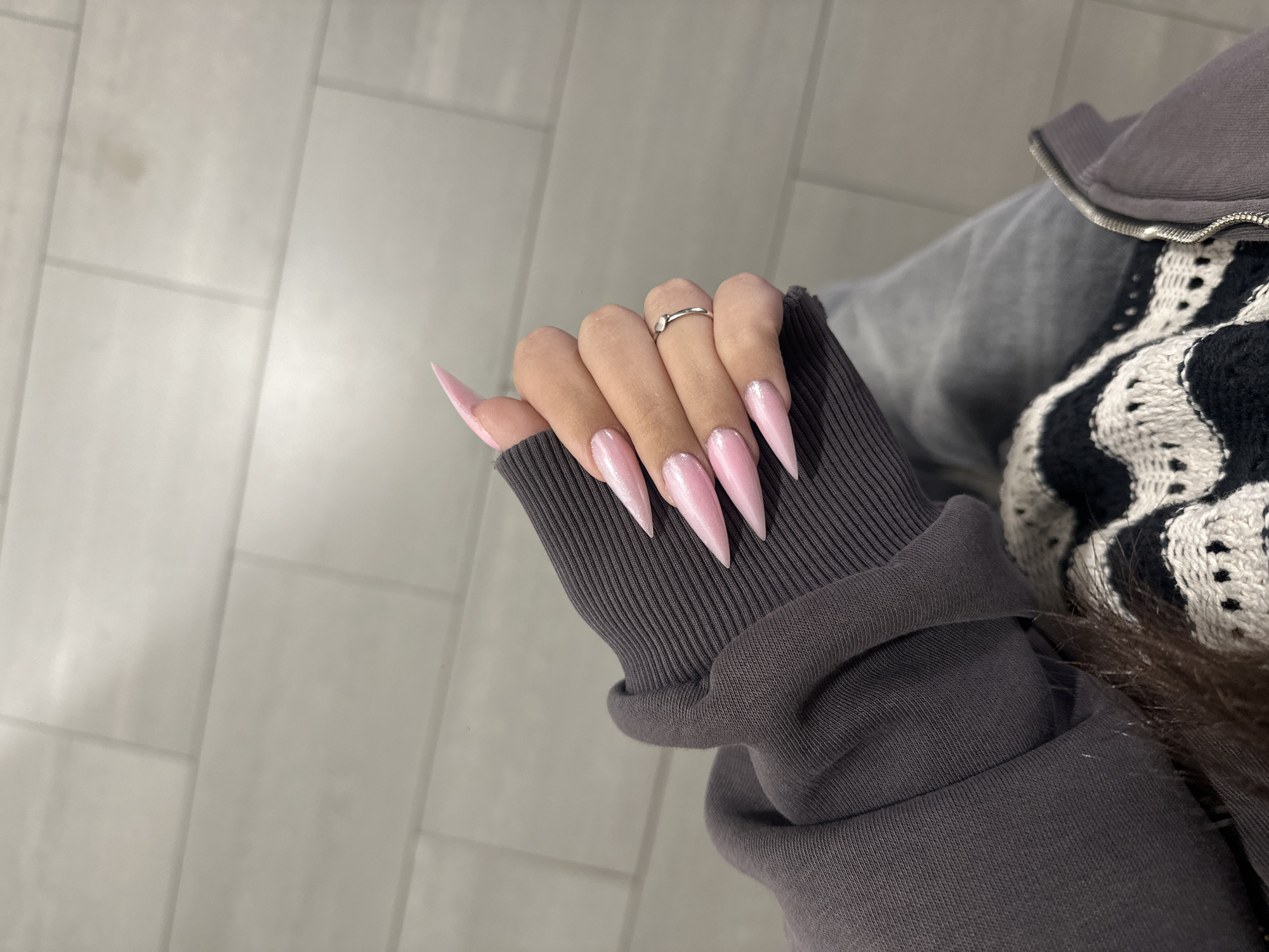 Person with pink manicured nails spotted near photo display in Yerevan