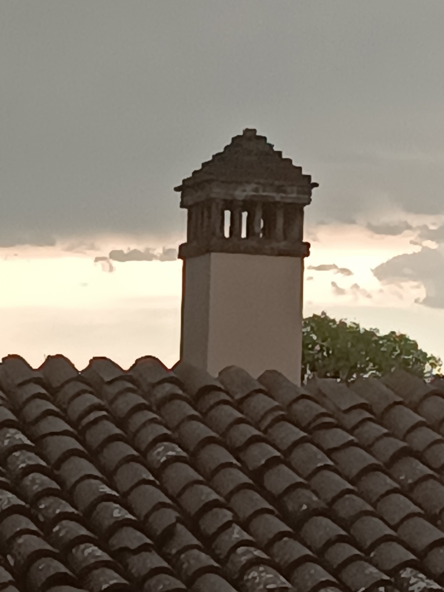 Mammatus clouds and a vivid sunset over Viadana rooftops