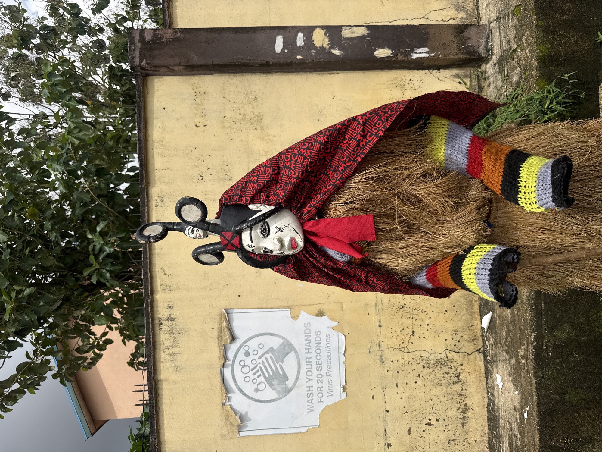 Traditional masquerade figures gather in Alagba, Nigeria