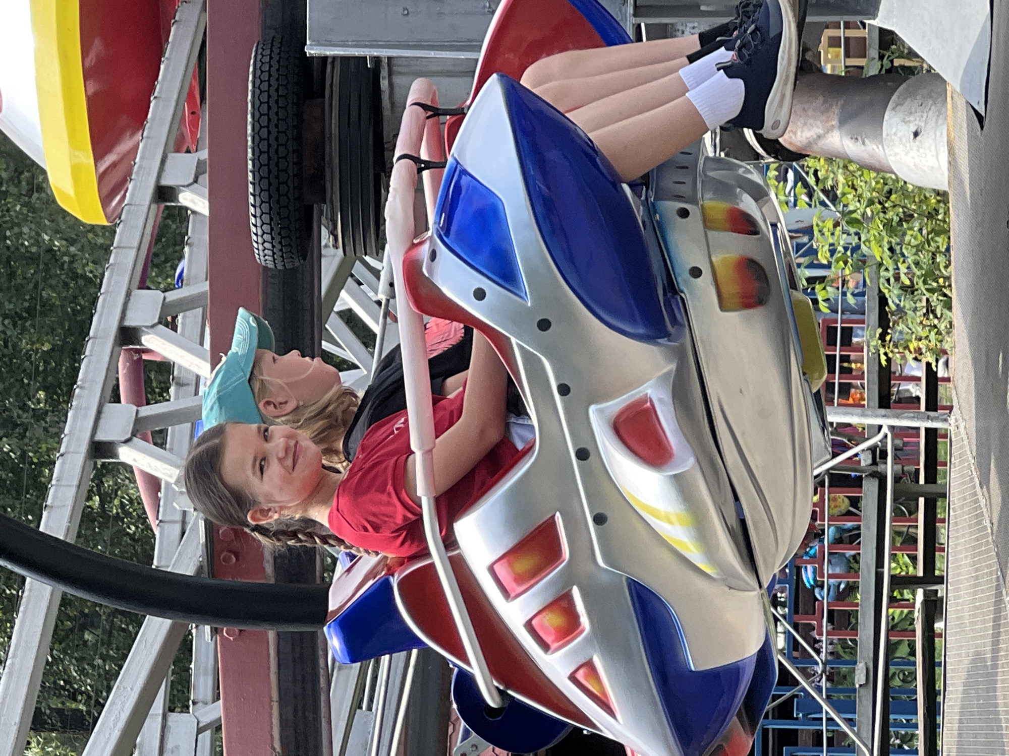 Summer day at a Chaikovsky amusement park, rides and selfies