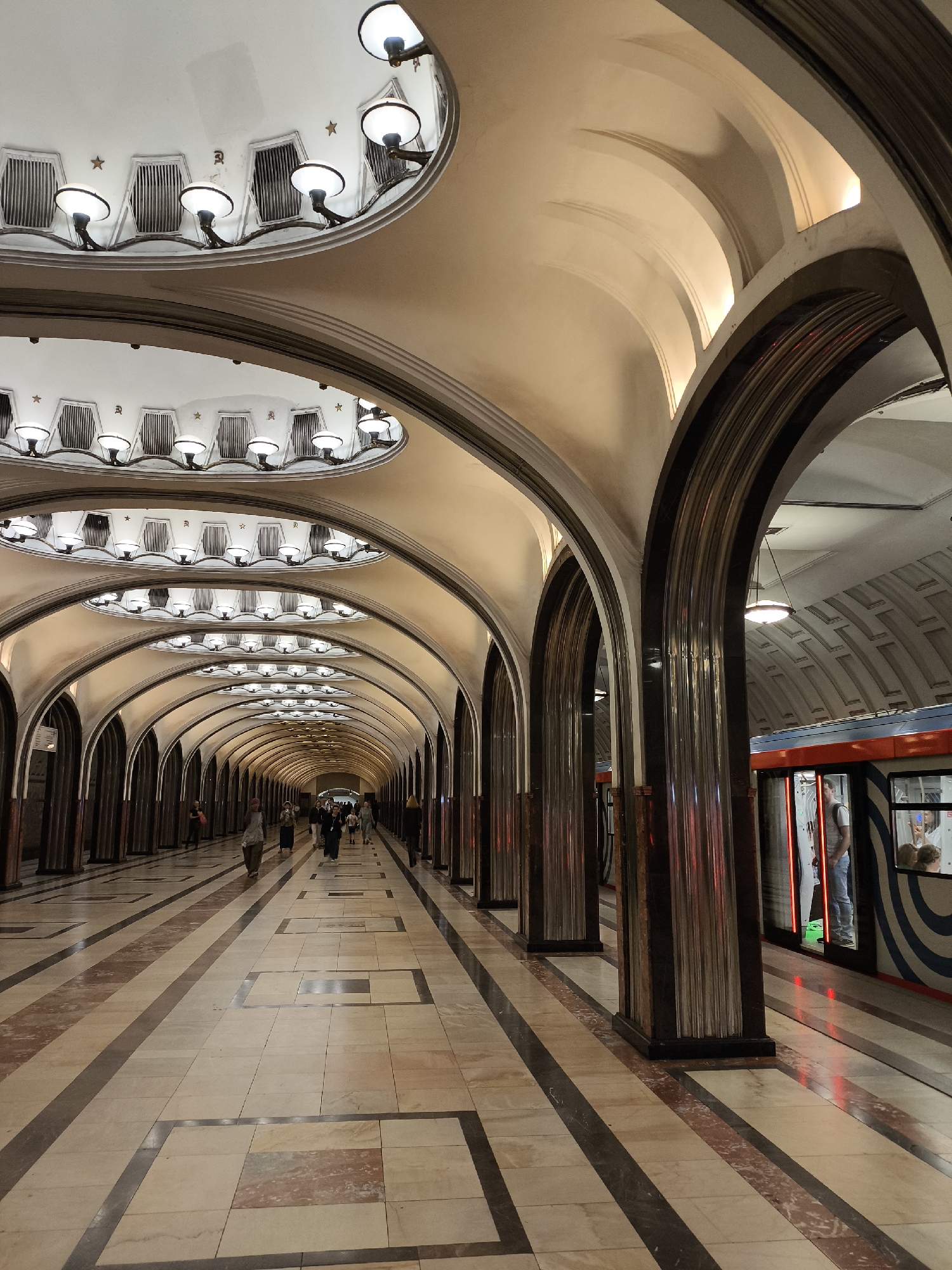 Moscow metro halls and rainy city streets, June afternoon