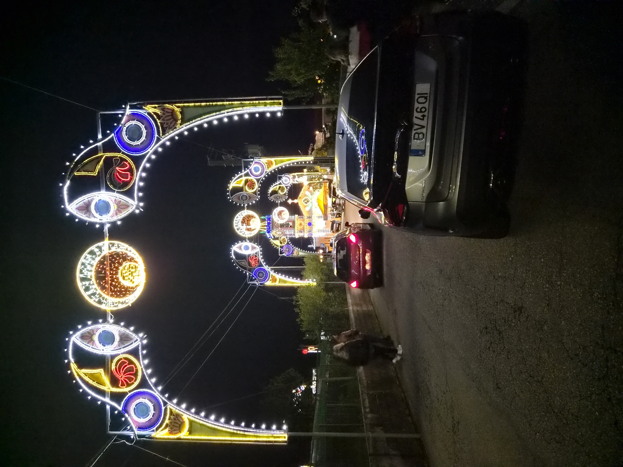 Nighttime festival with music and lights illuminates Barcelos, Portugal