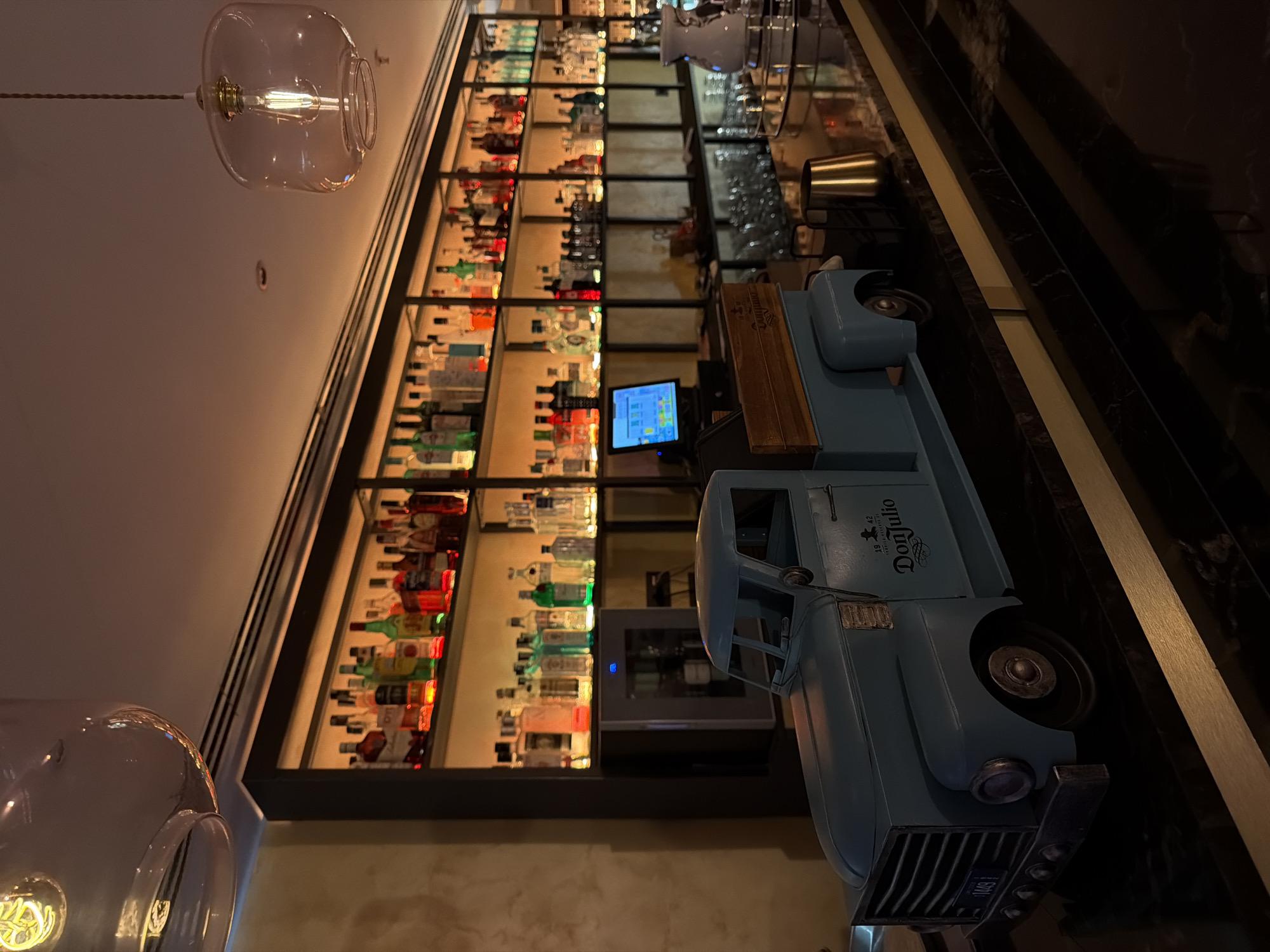 Bar interior with Don Julio display captured in Valencia