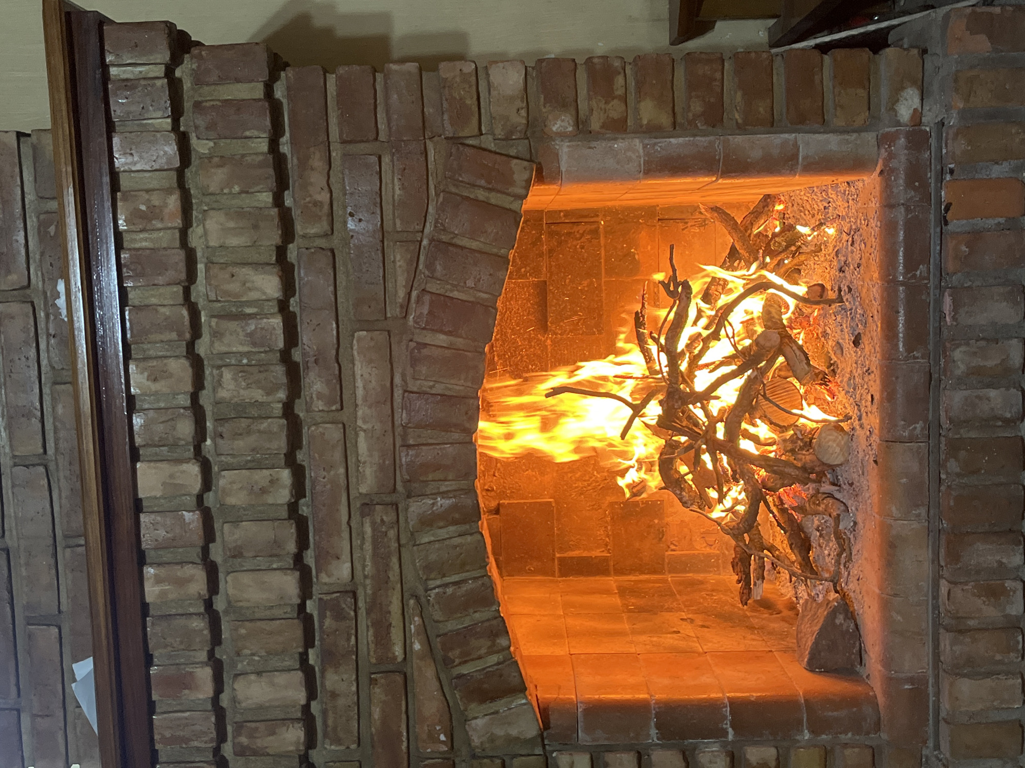 Ezeiza resident documents cozy fireplace and autumn night scenes