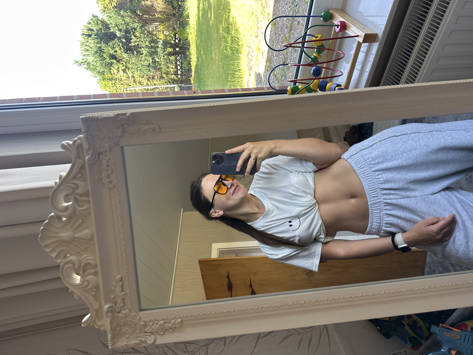 Woman takes mirror selfies with stuffed elephant in Fredenbeck