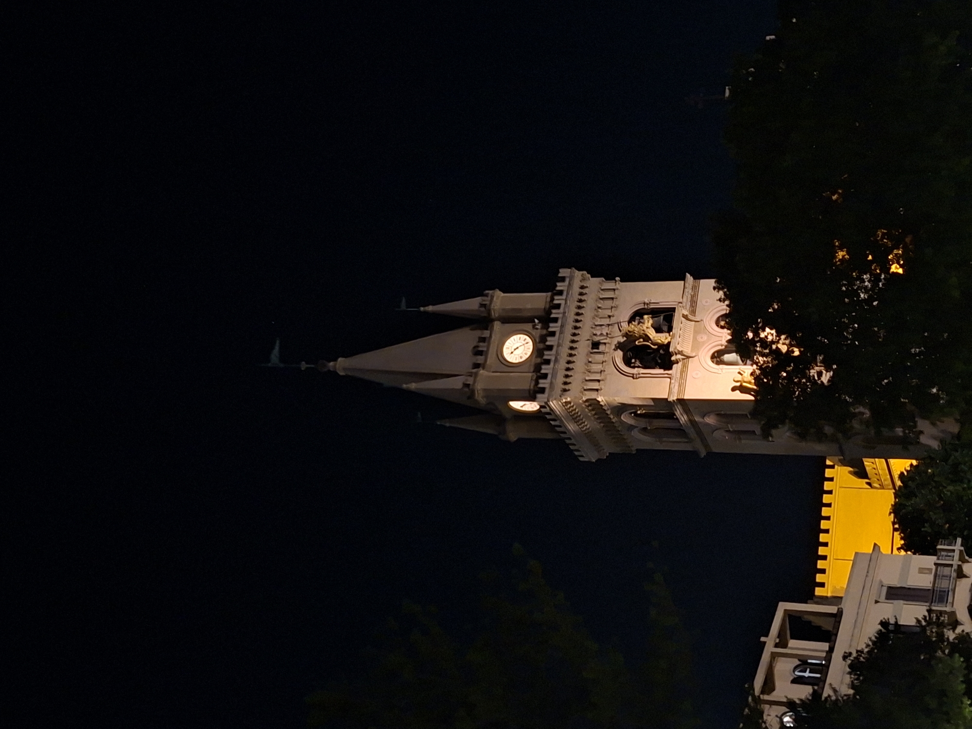 Nighttime architectural landmarks observed across multiple locations