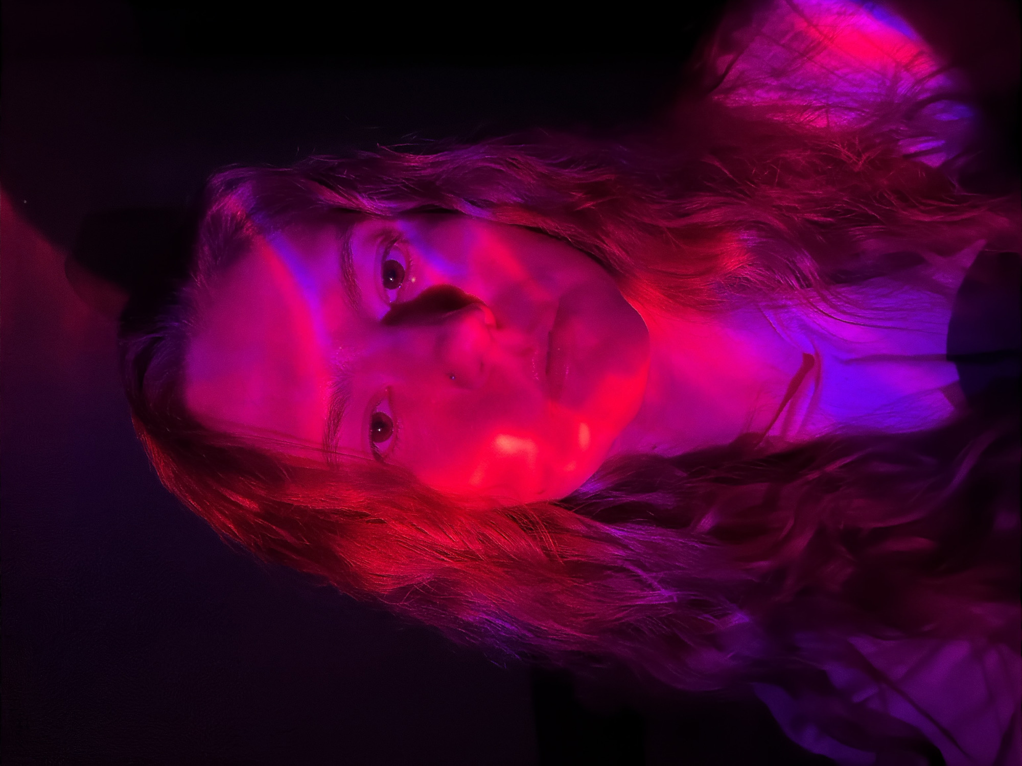Portrait session captured under colorful lighting in Belgrade suburb