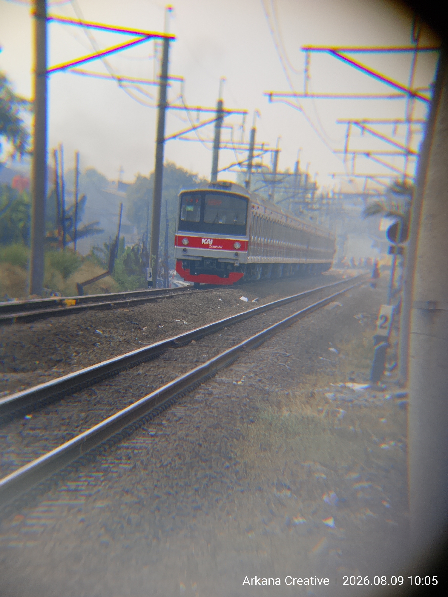 KAI Commuter trains running through Bekasi's rail corridor
