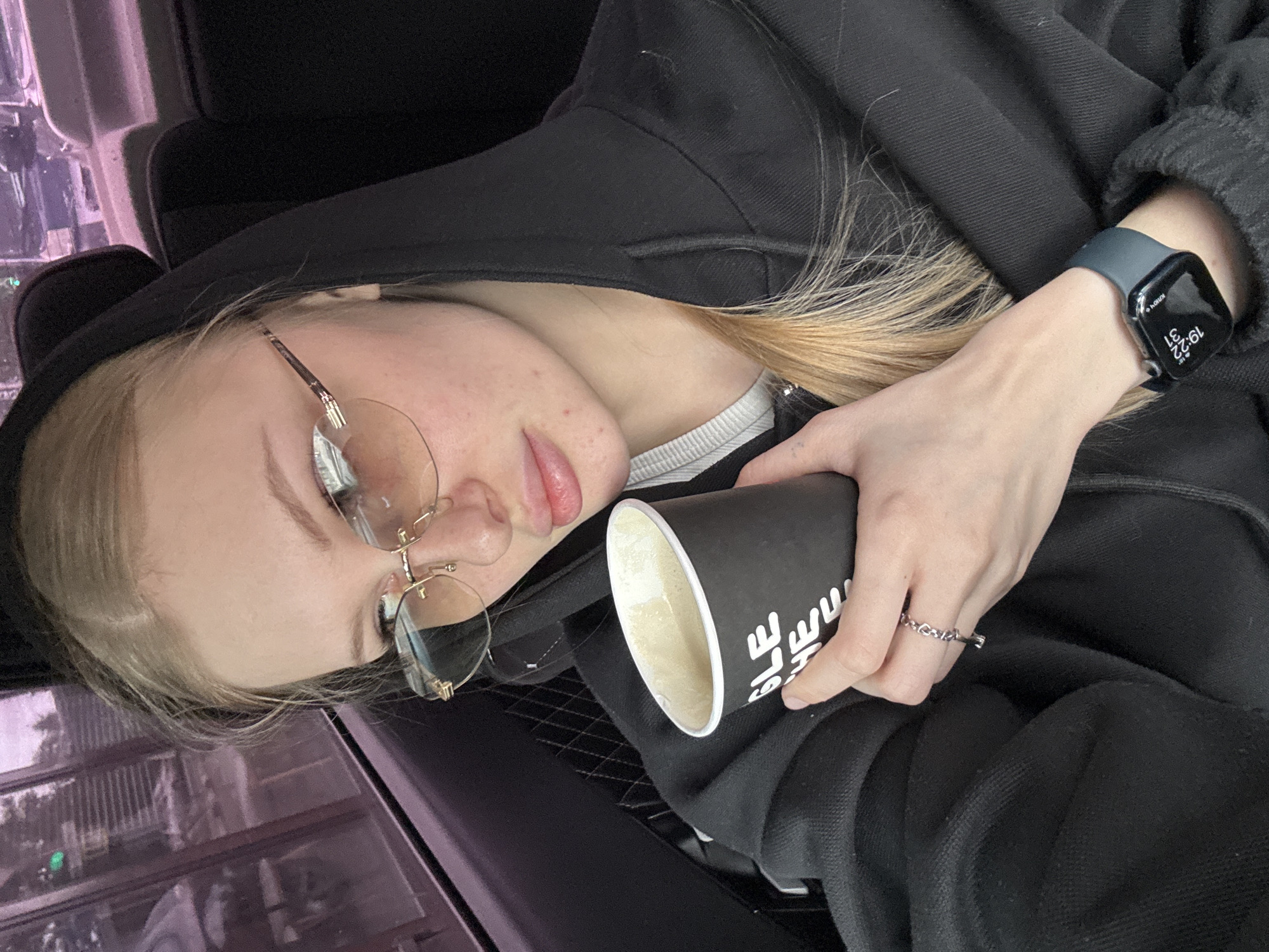 Young woman visits coffee shop in Perm, Russia