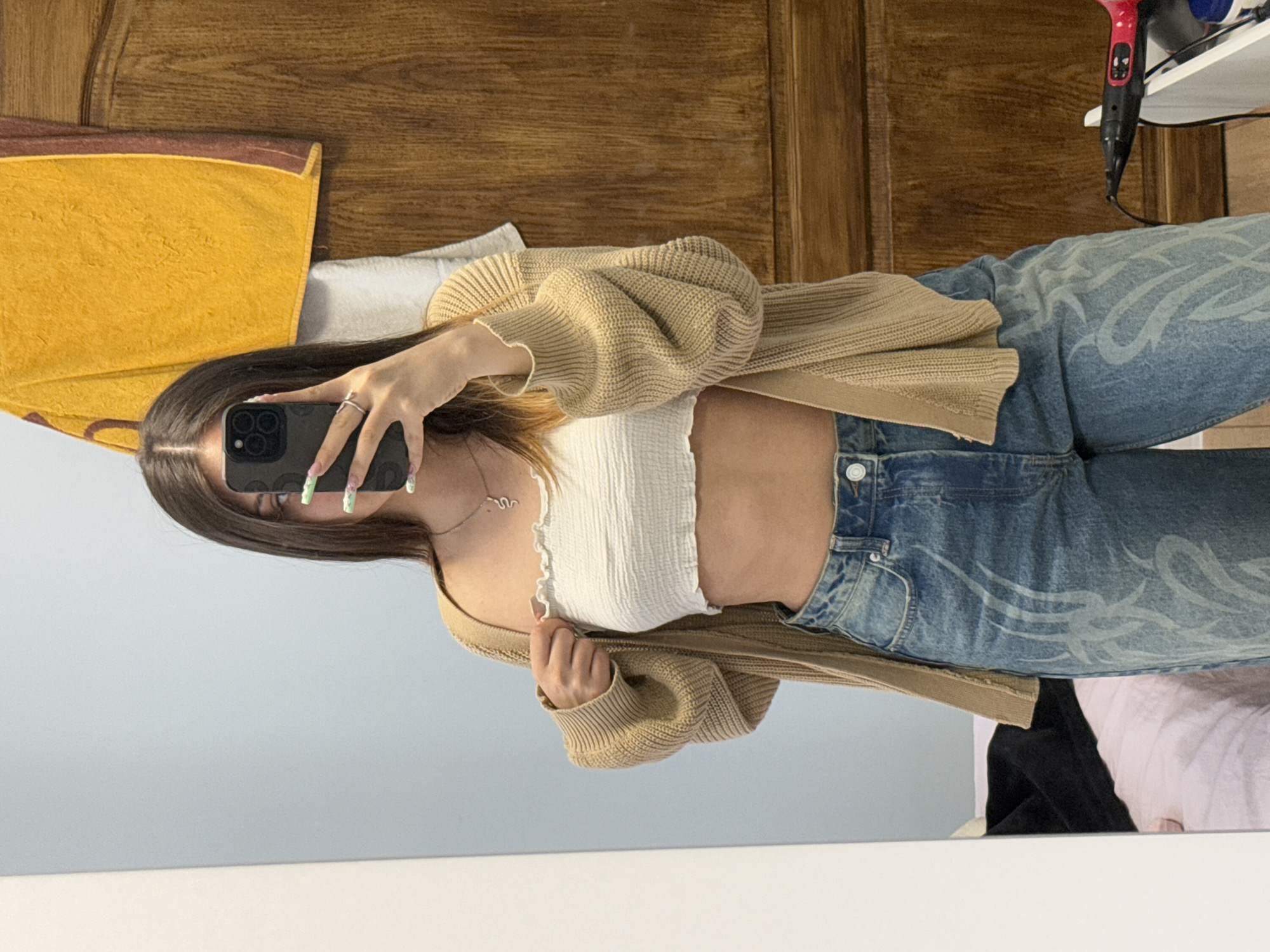 Woman takes mirror selfie in Sofia apartment