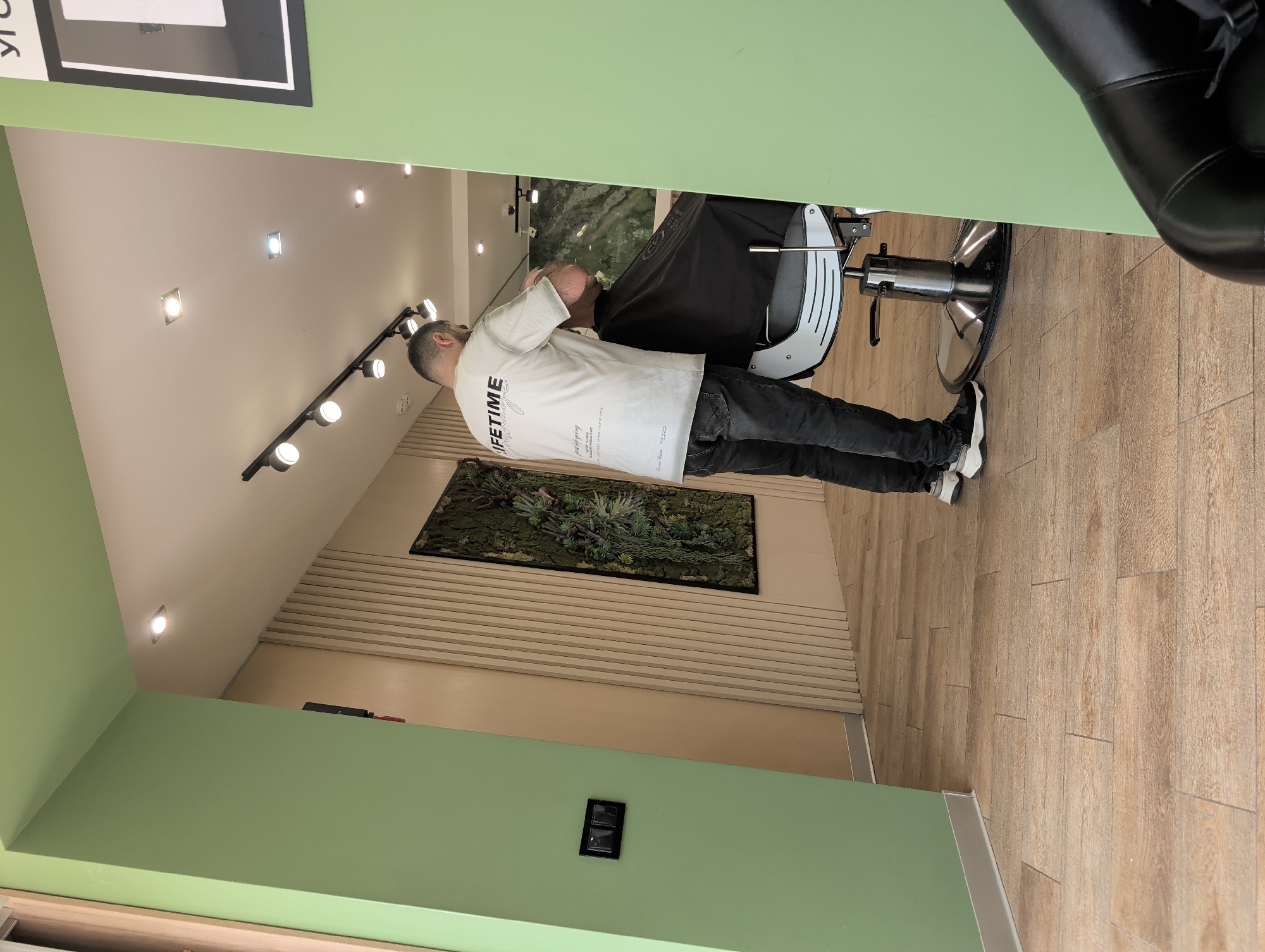Haircut in progress at a Reutov barbershop