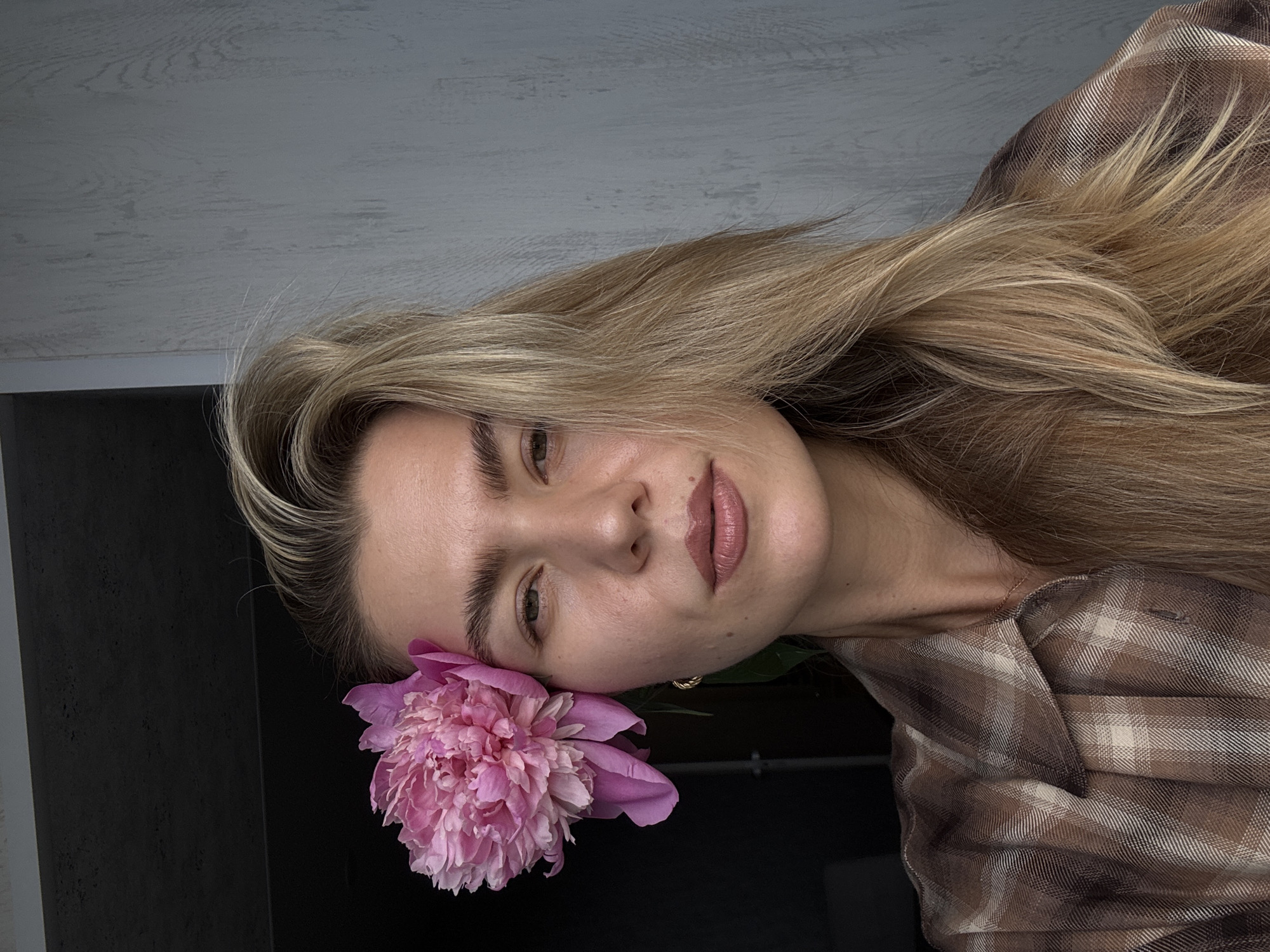Morning domestic scenes: woman with peonies, Bengal cat, treadmill exercise