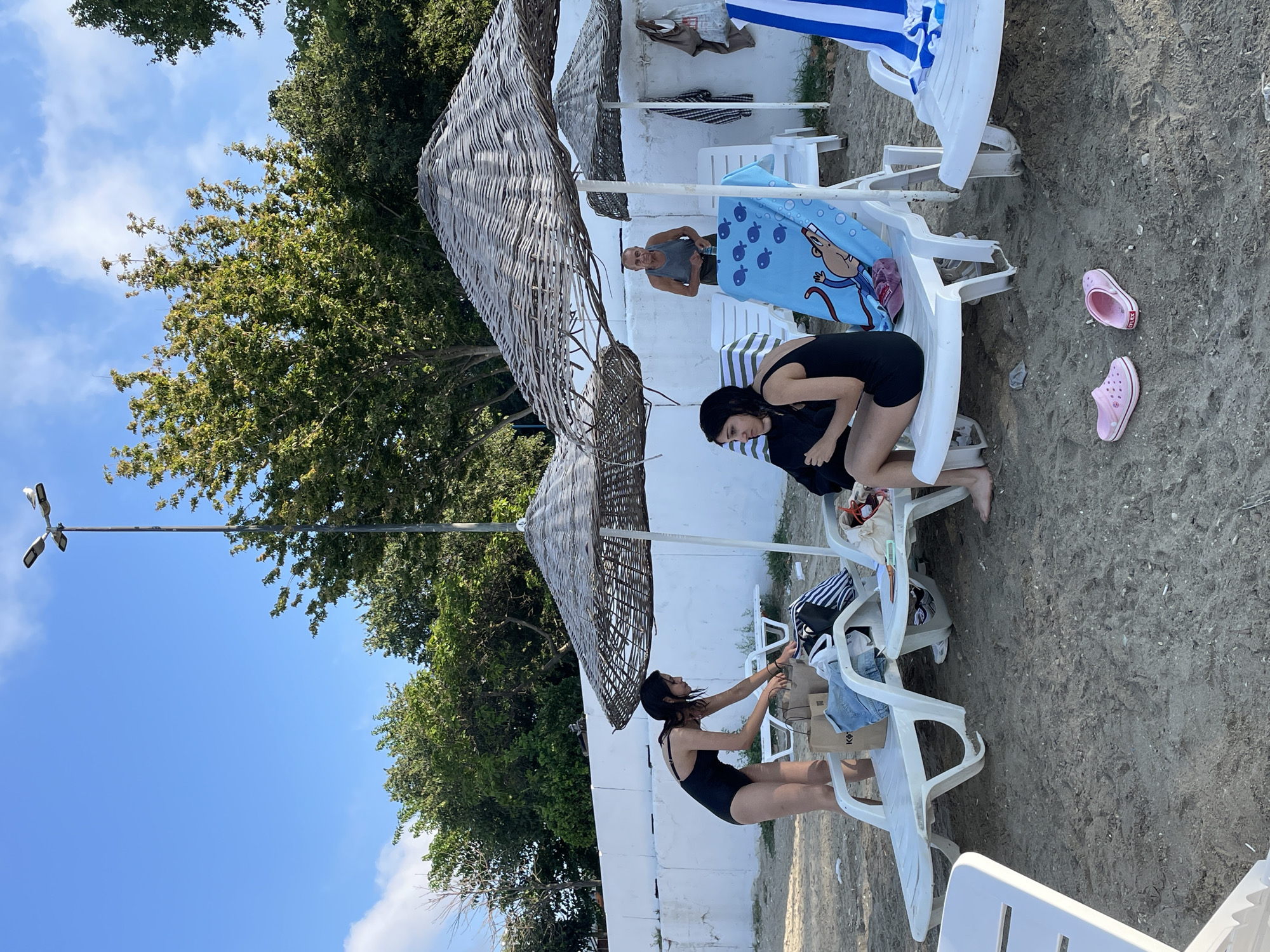Summer morning at Moda Beach, Kadıköy — swimmers and shoreline scenes