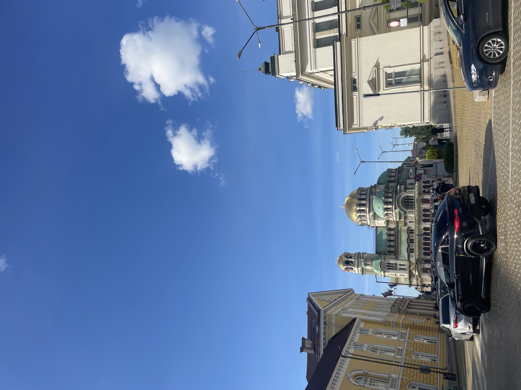 Witness documents afternoon street scenes across central Sofia landmarks