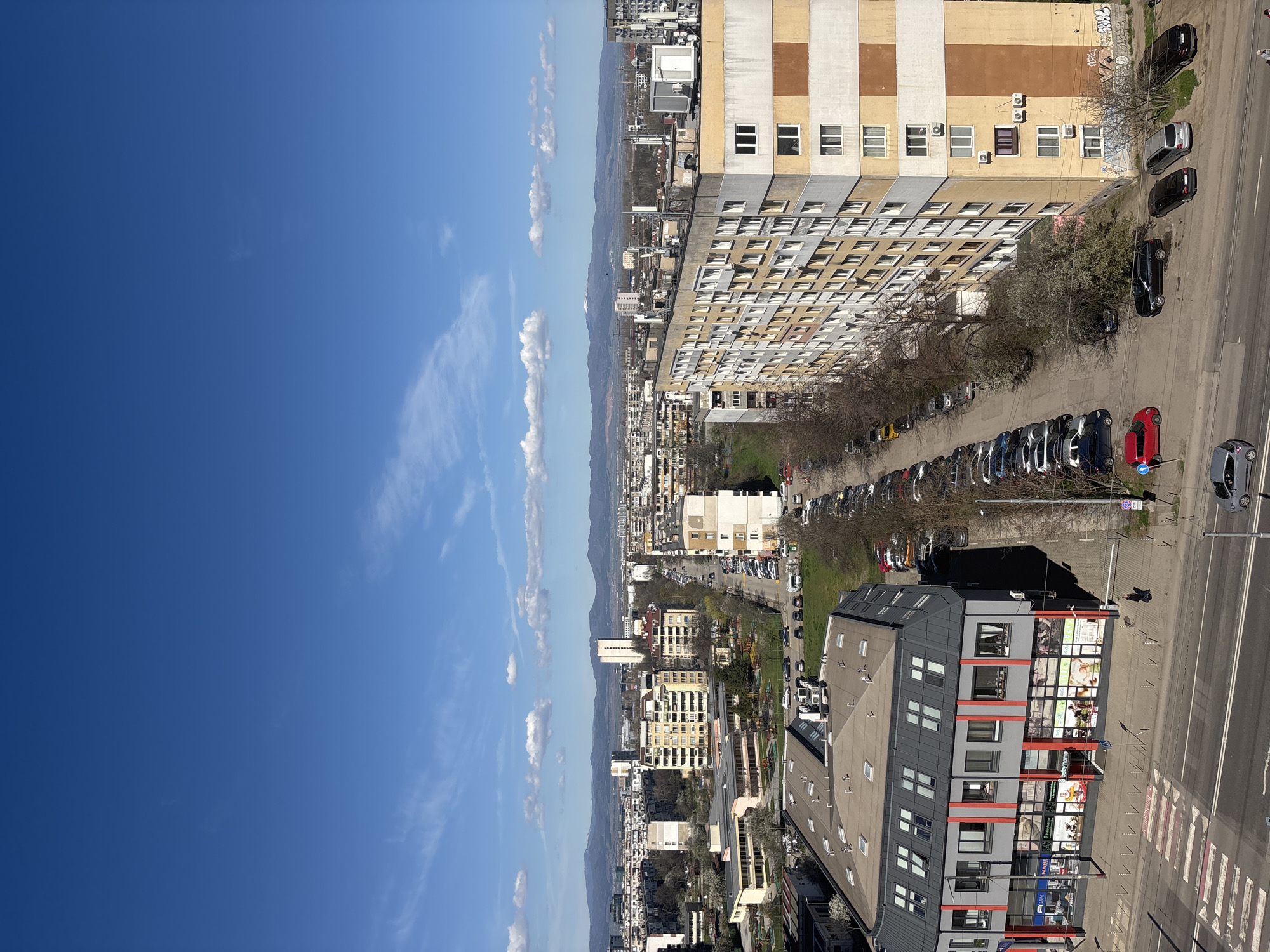 Sofia resident documents elevated cityscape views on spring afternoon
