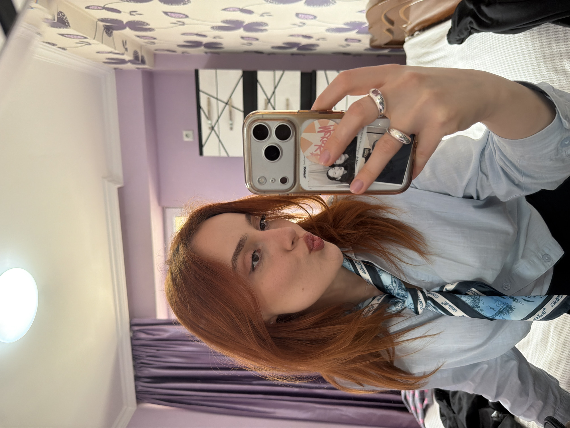 Woman takes selfies in Tbilisi indoor location
