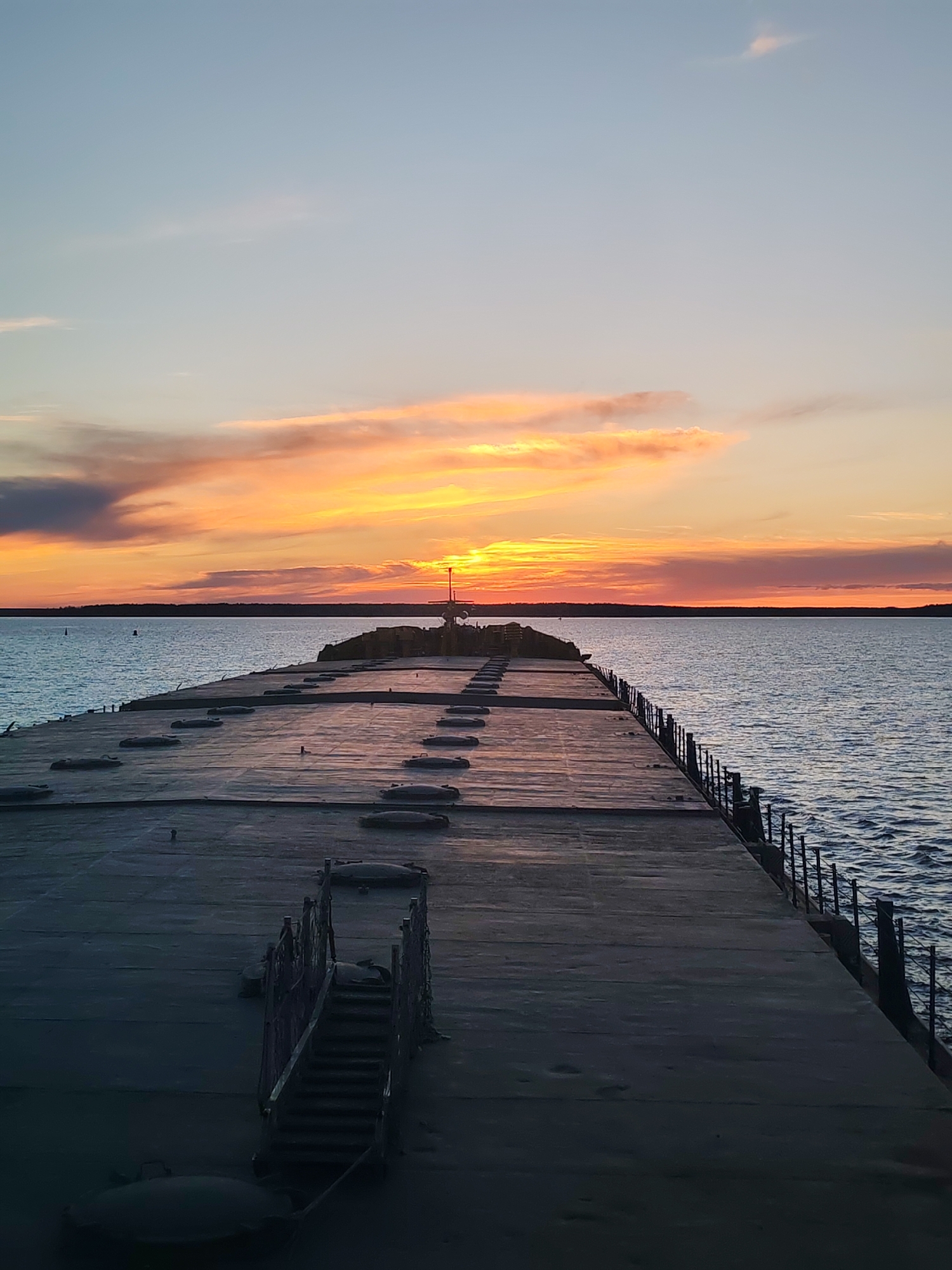 Concrete pier with metal railings documented in Russia