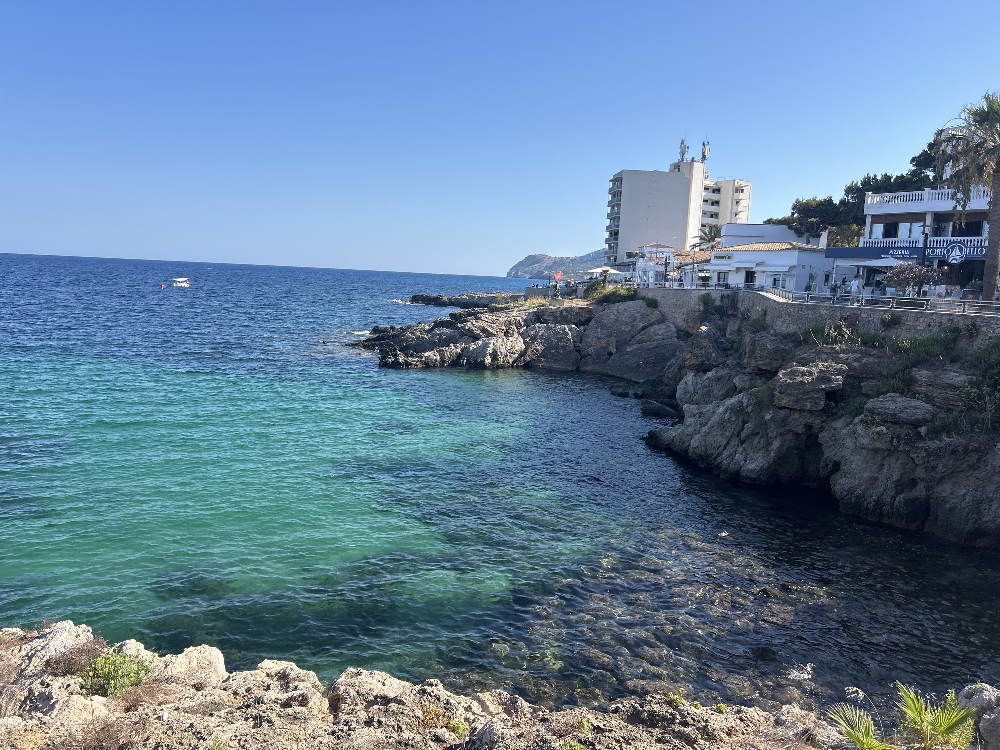 Sunny afternoon along the Cala Rajada waterfront
