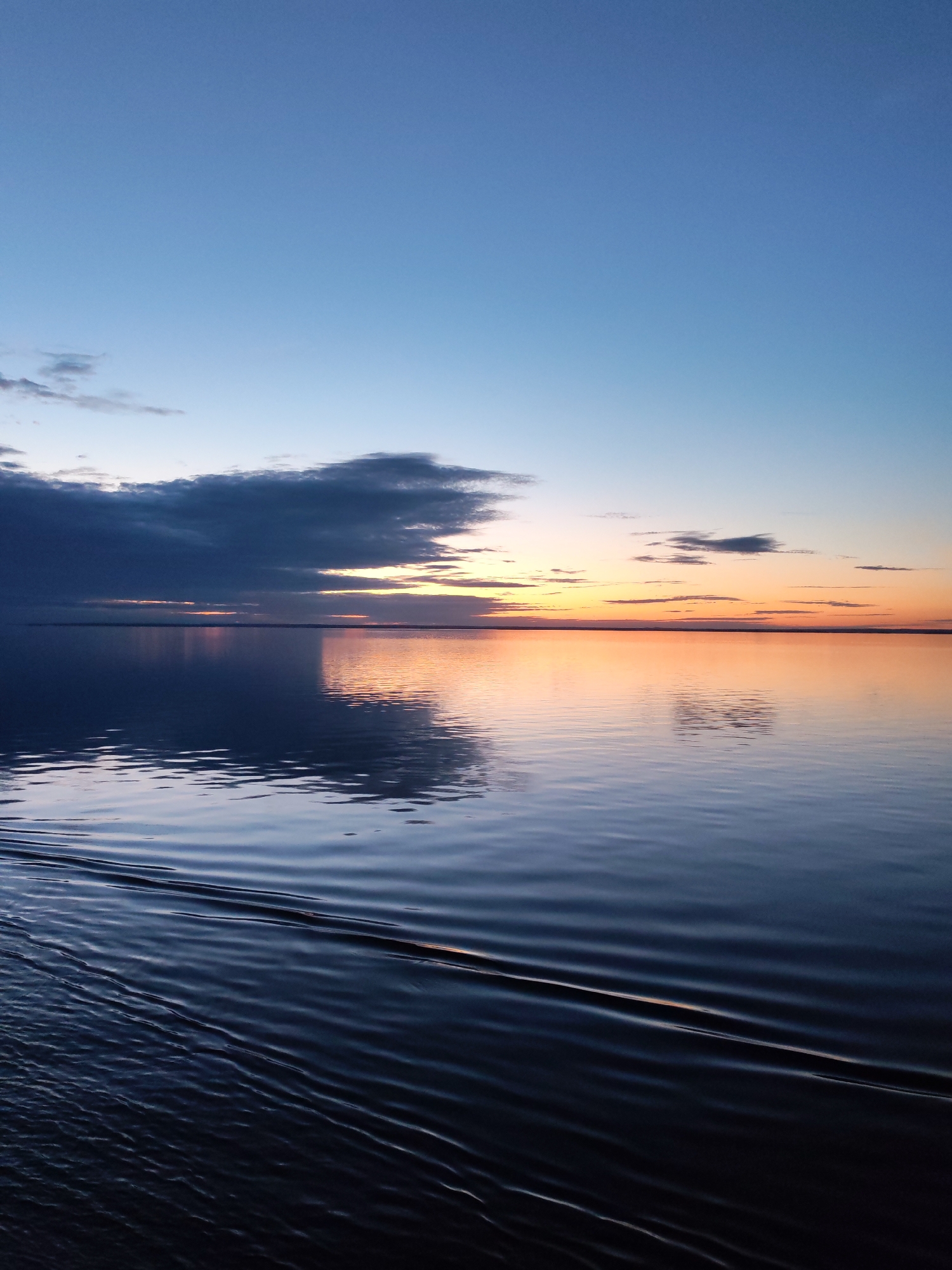 Dramatic sunrise or sunset captured over Russian waters
