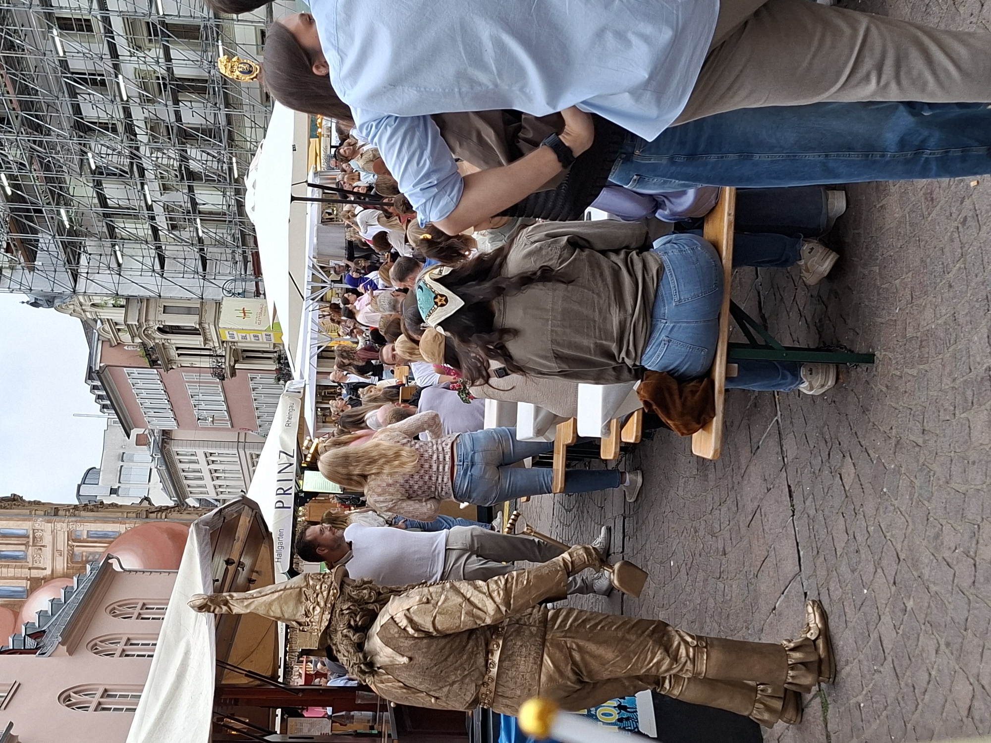 Wine and street performance outside Wiesbaden's state theatre