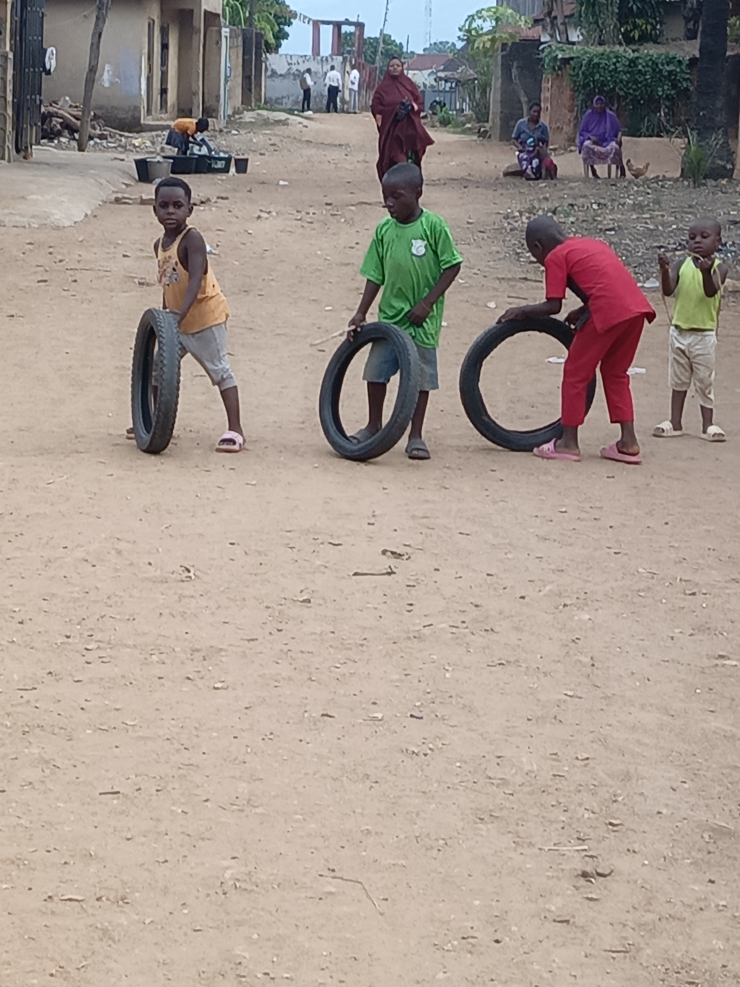 Boys play on street in Akwanga, Nigeria