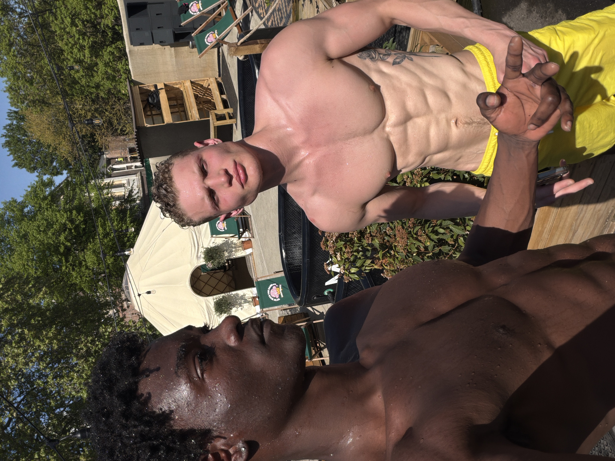 Two men sunbathe, take selfies on London rooftop