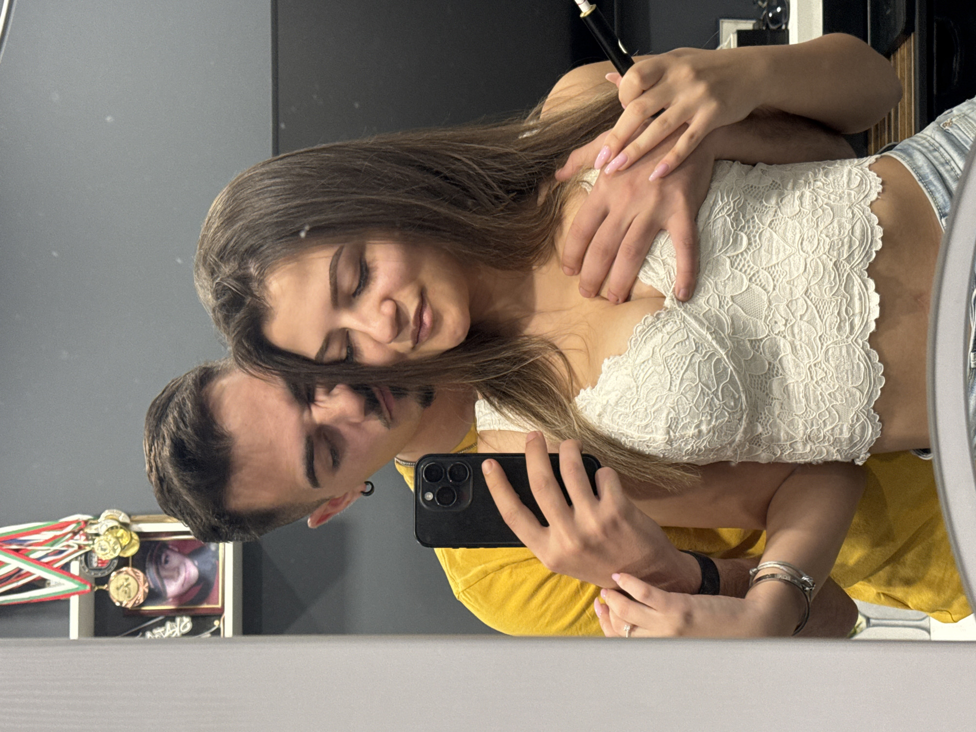 Woman captures mirror selfie in decorated Sofia apartment