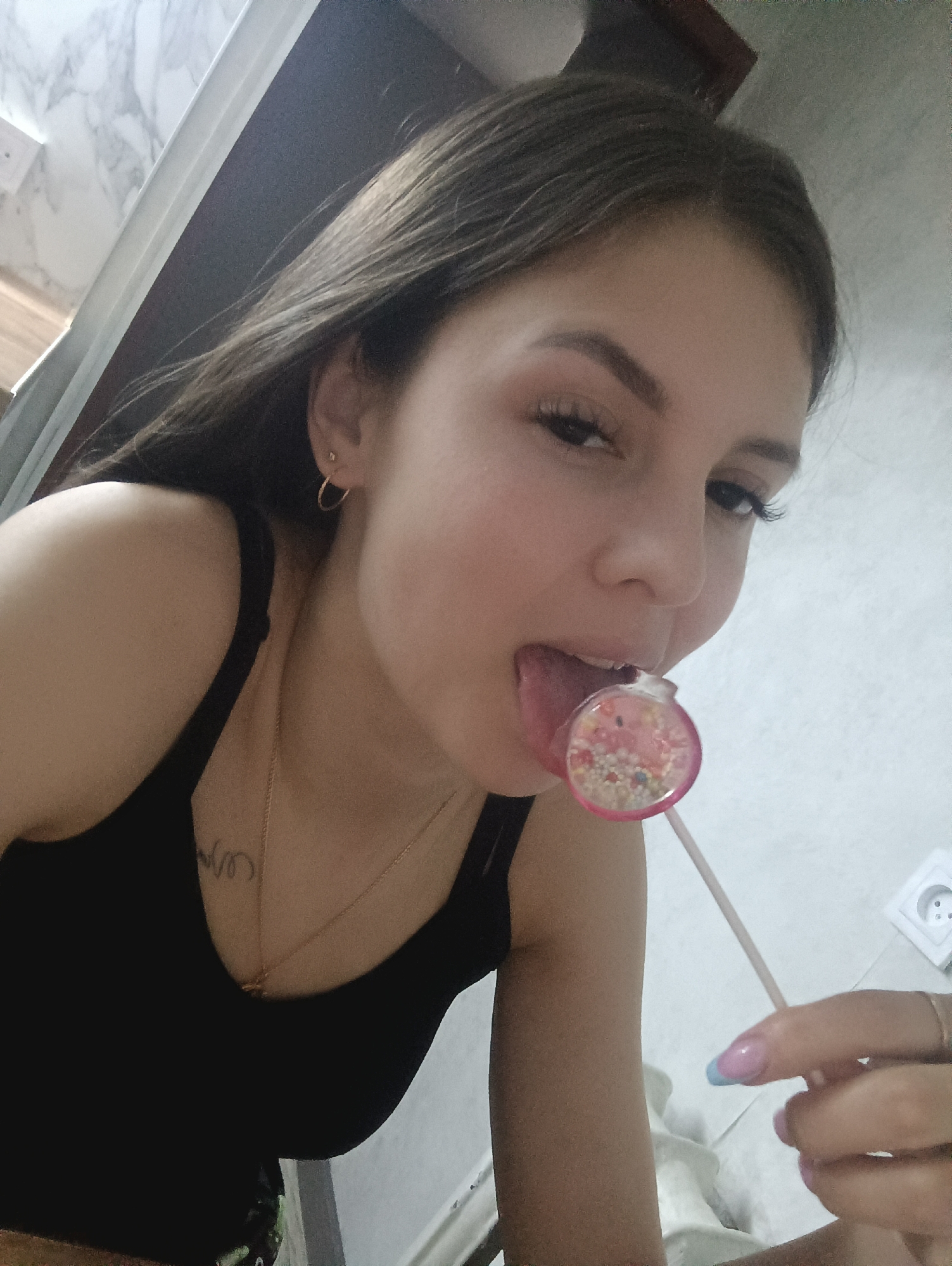 Woman eating candy and fruit indoors captured in memory sequence