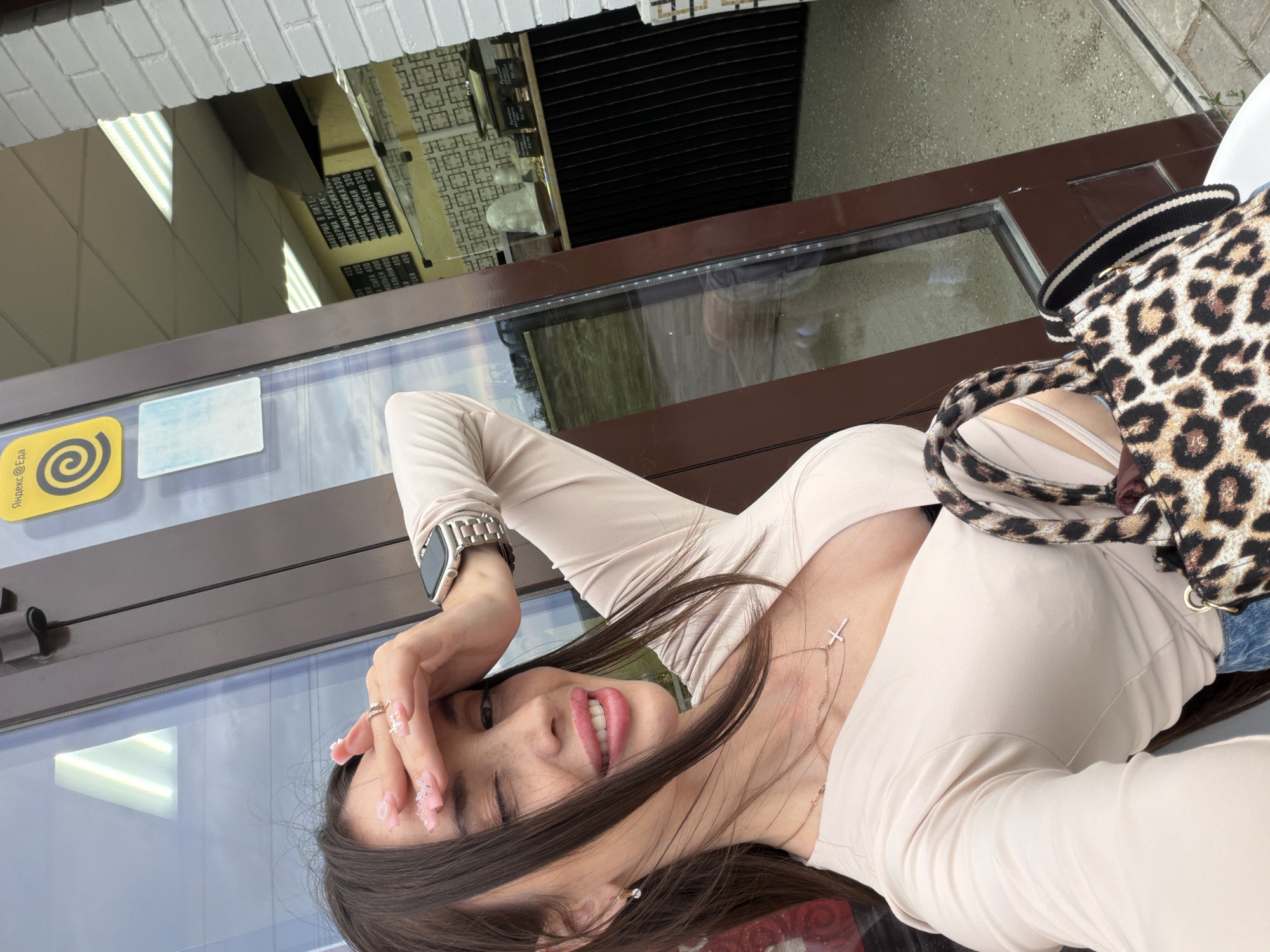 Woman documents casual photo session on Saint Petersburg streets