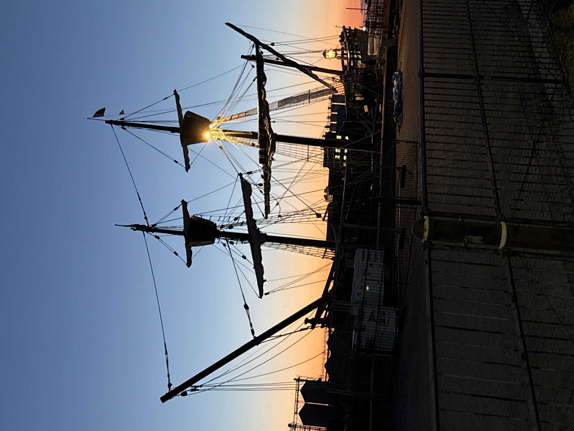 Historic tall ship docked at dusk in Great Yarmouth