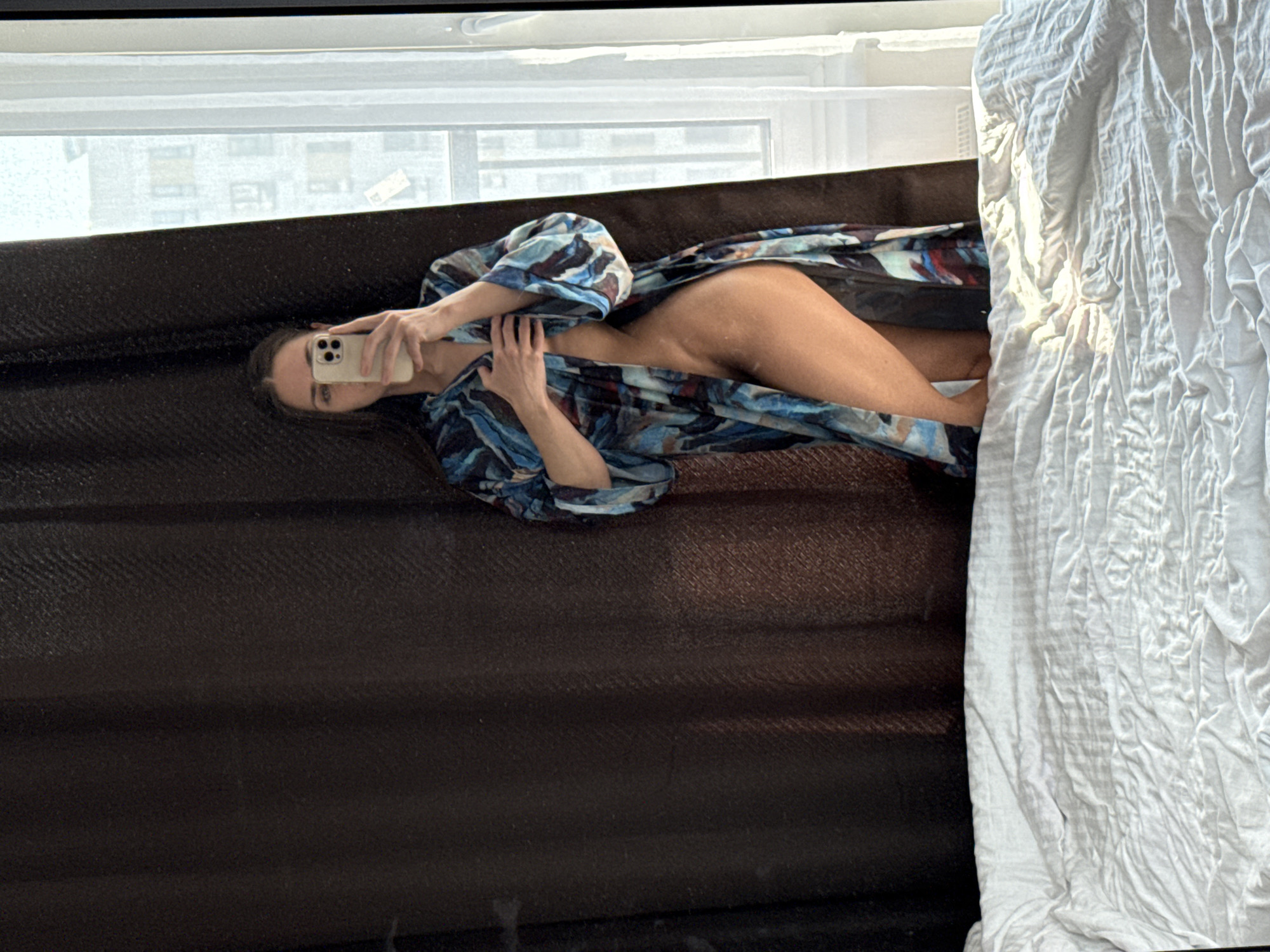 Woman takes morning selfies in Lyubertsy apartment