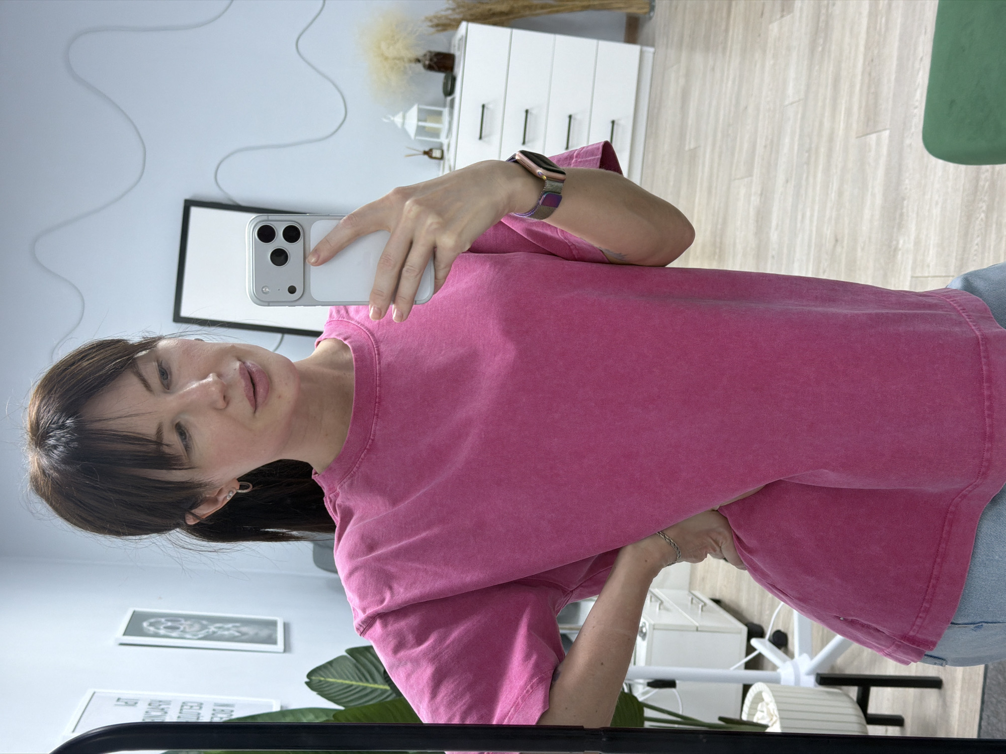 Woman takes selfie indoors in Perm, Russia