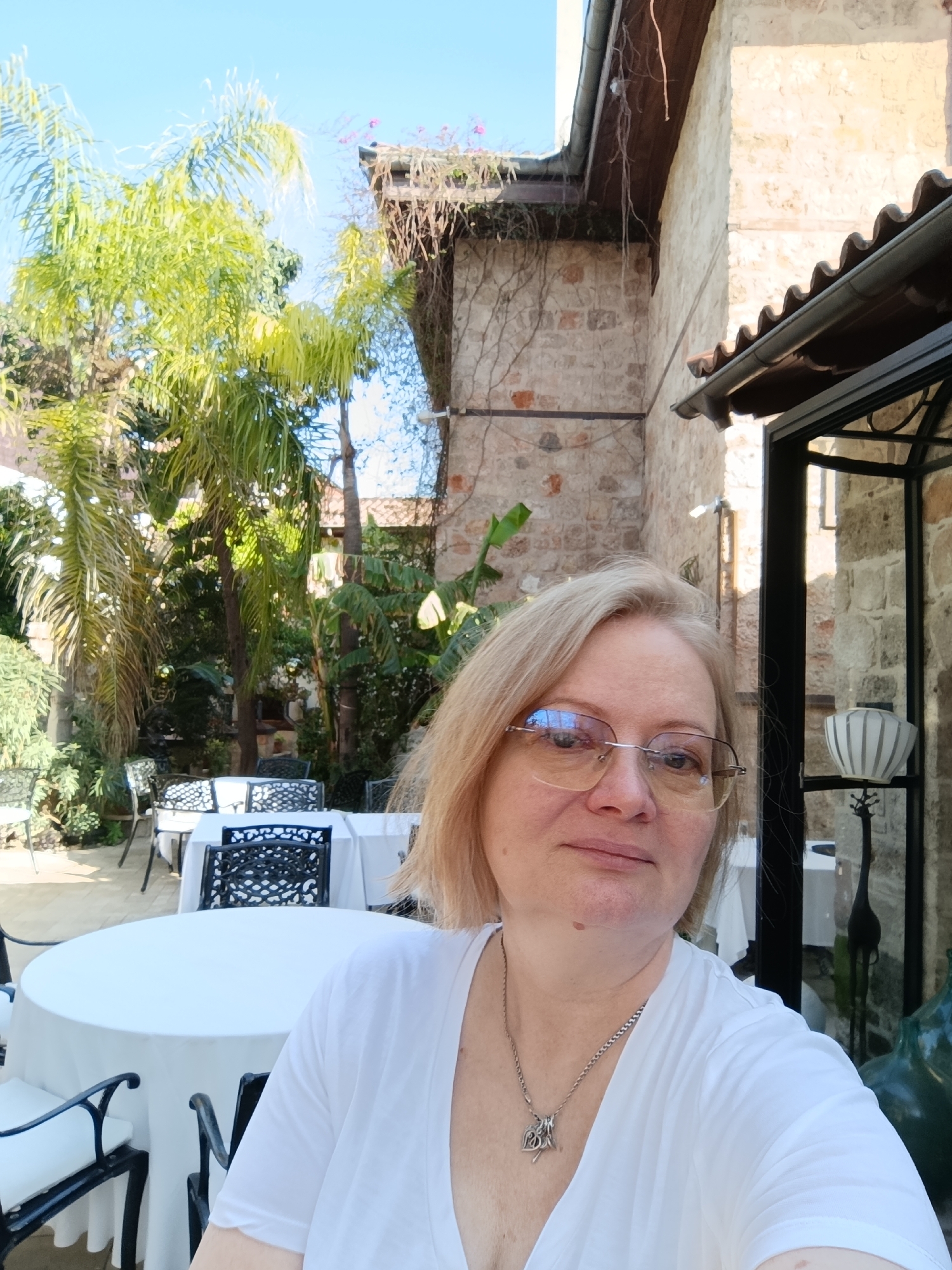 Woman documents Antalya restaurant visit in historic district