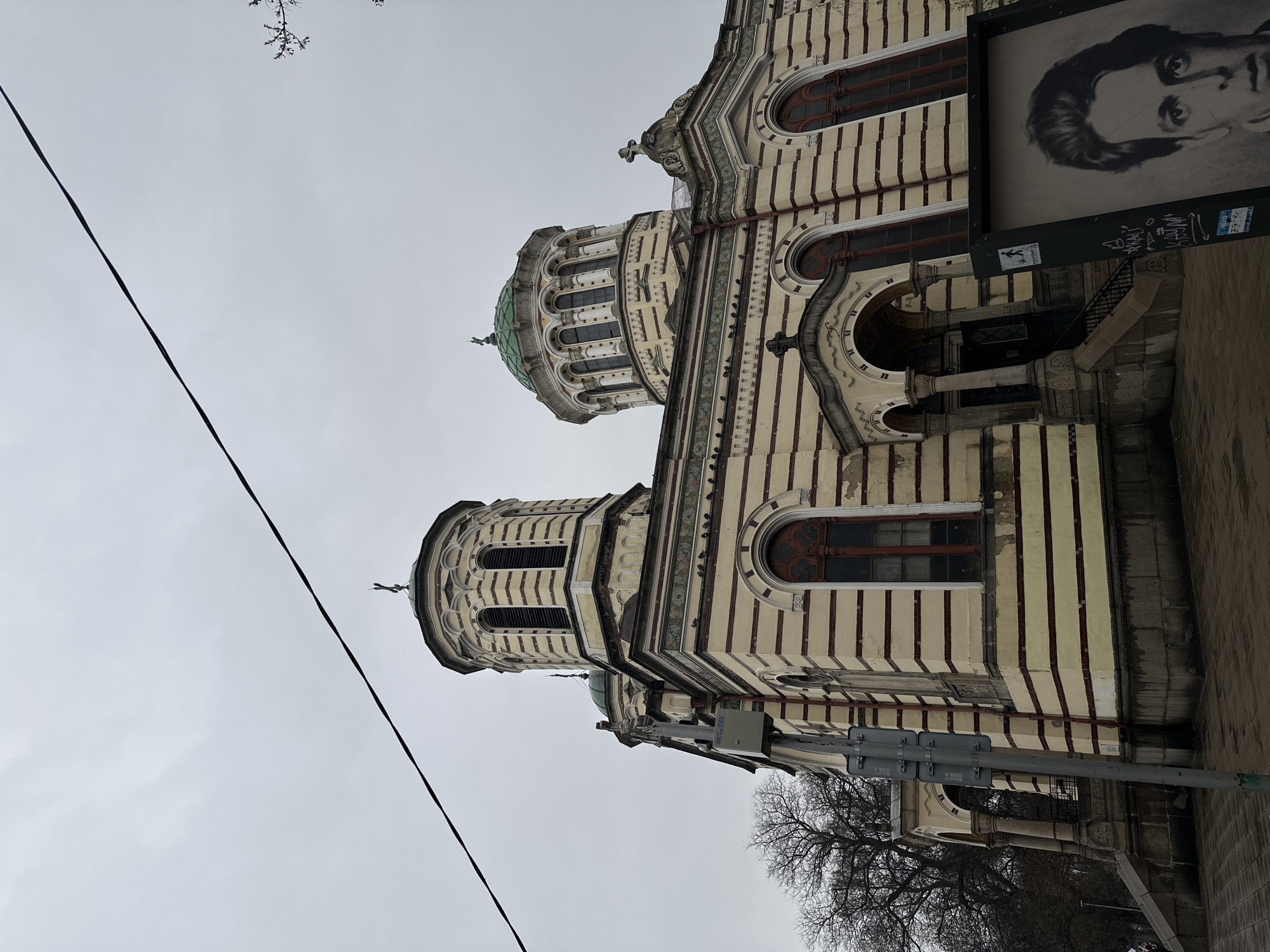 Pedestrians with umbrellas spotted near Sofia landmarks
