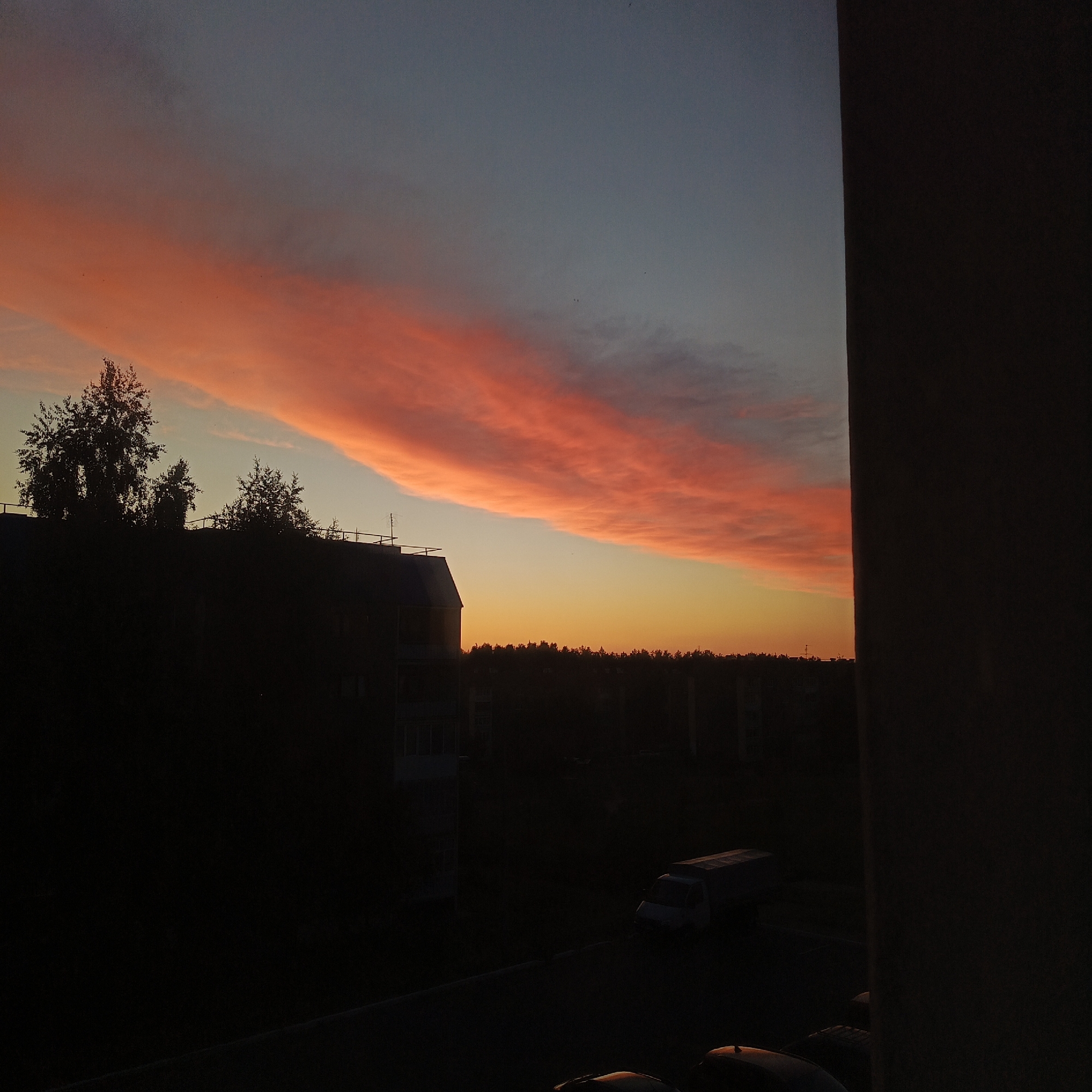 Dramatic sunset captured over Markovskii residential area with domestic moments