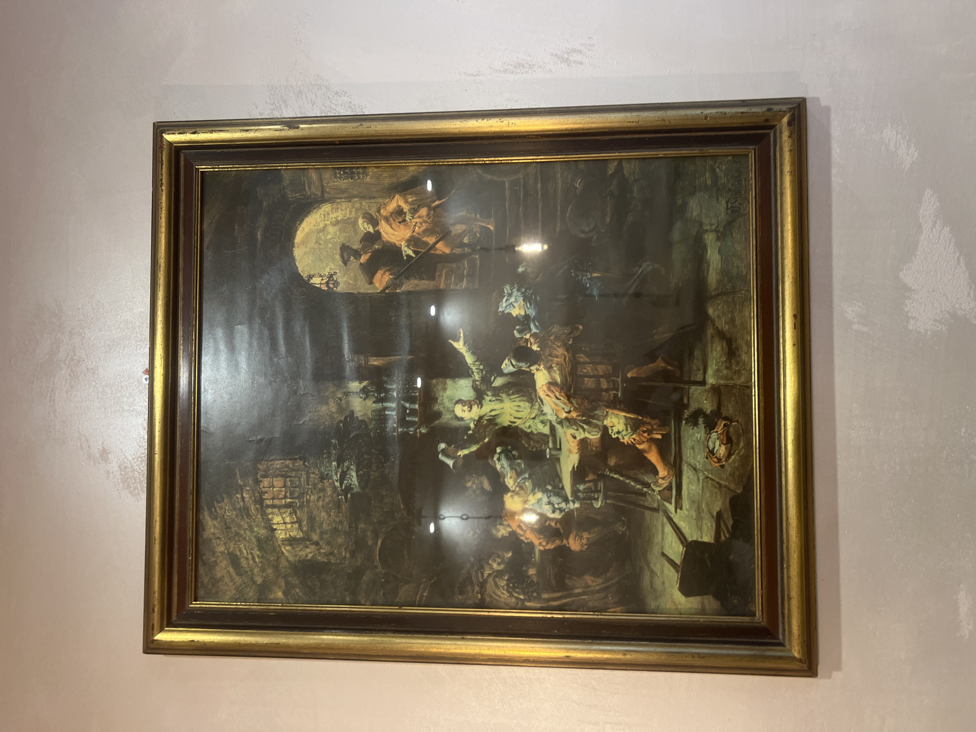 Indoor scenes with historical painting and cat observed