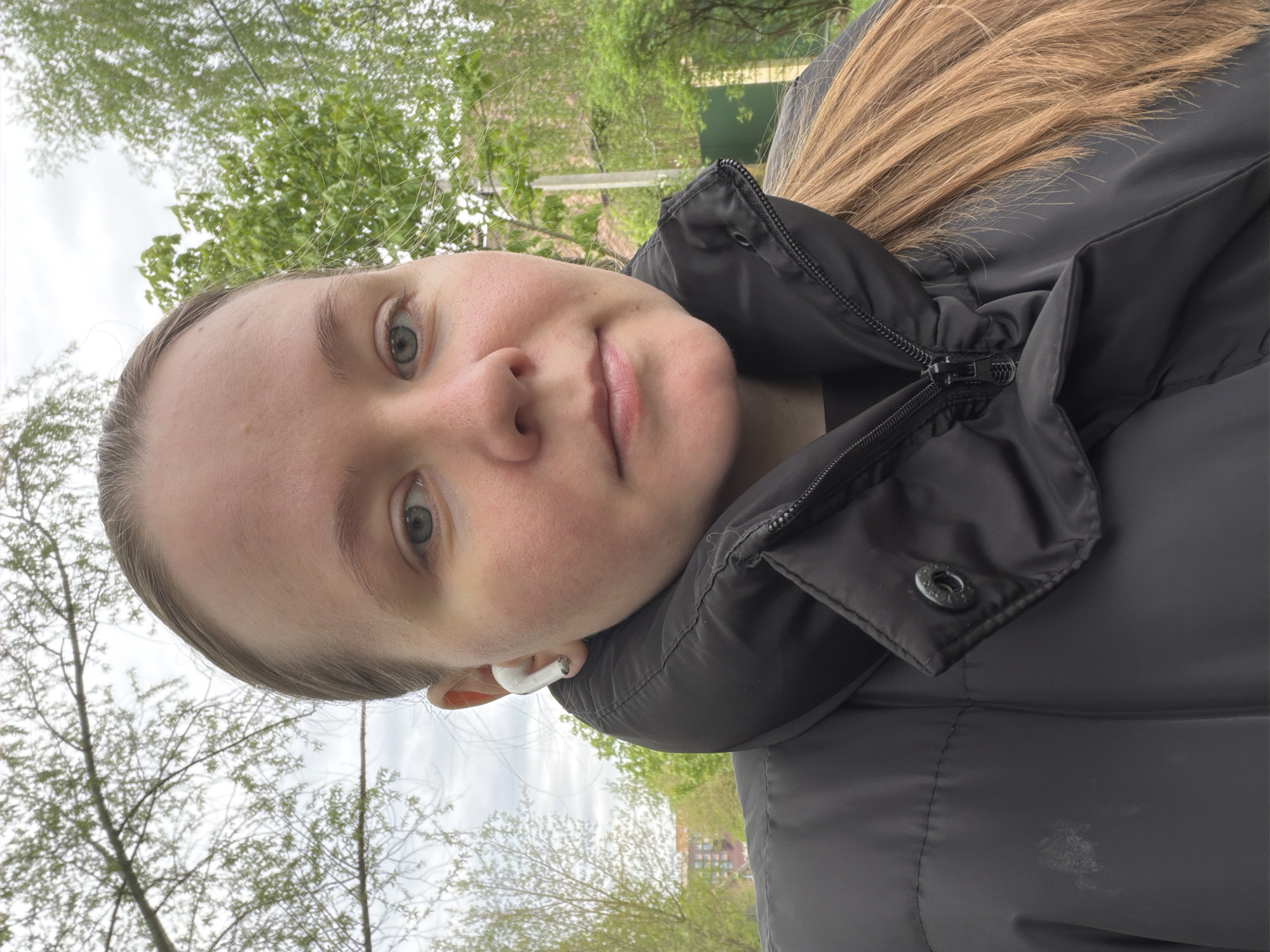 Person in black jacket photographed smiling in Shcherbinka