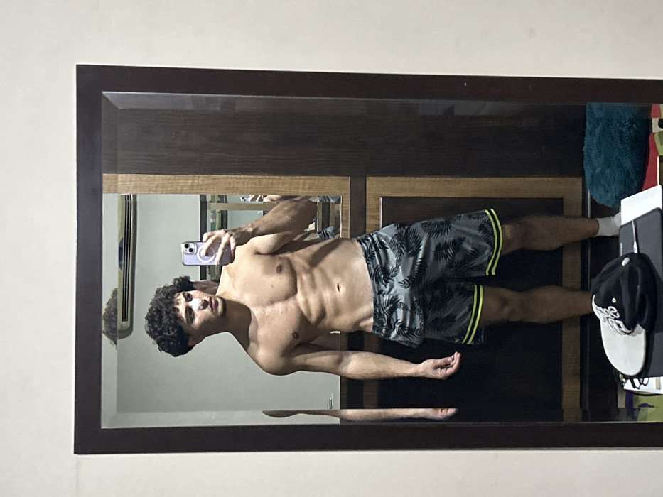 Man takes mirror selfies in Damascus apartment early morning