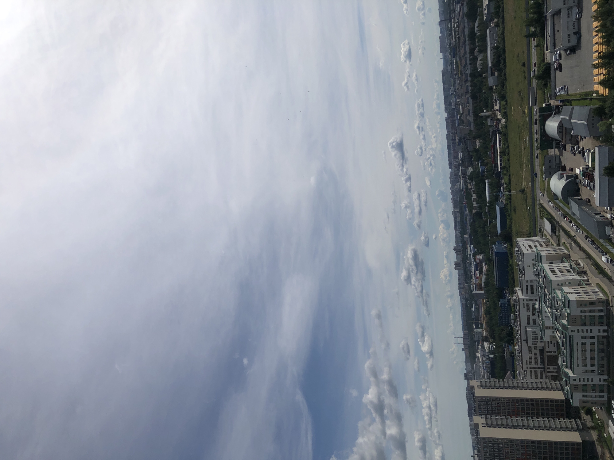 Multiple angles on a dense urban cityscape with towers and wide roads
