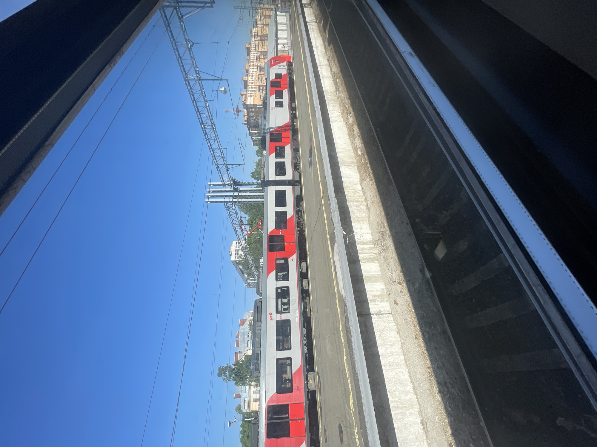 Electric train stationary at Saint Petersburg railway platform