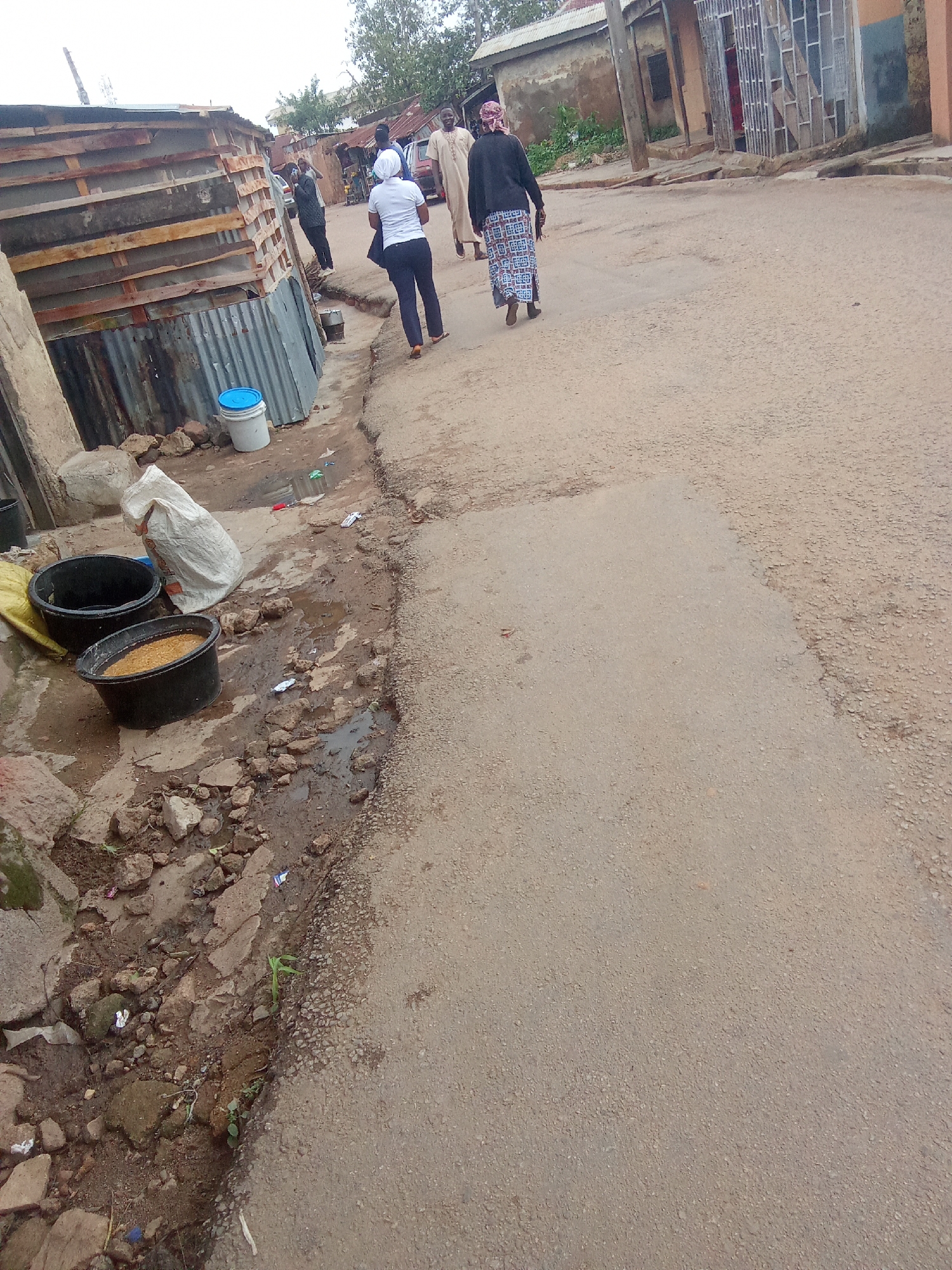 Ordinary street life documented across Jos, Nigeria midday scenes