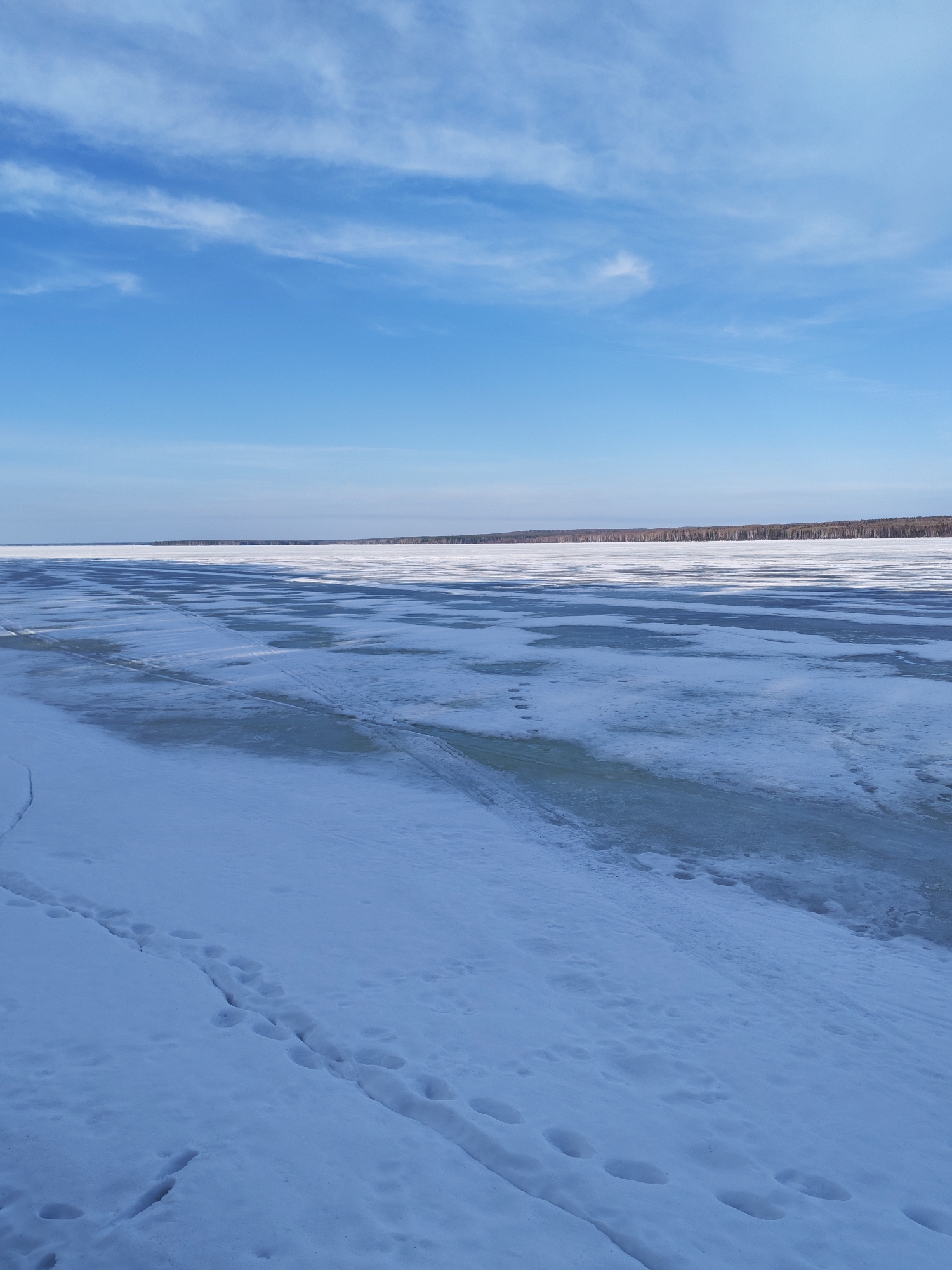 Frozen Votkinsk Reservoir documented in Chaikovsky, Russia winter scenes